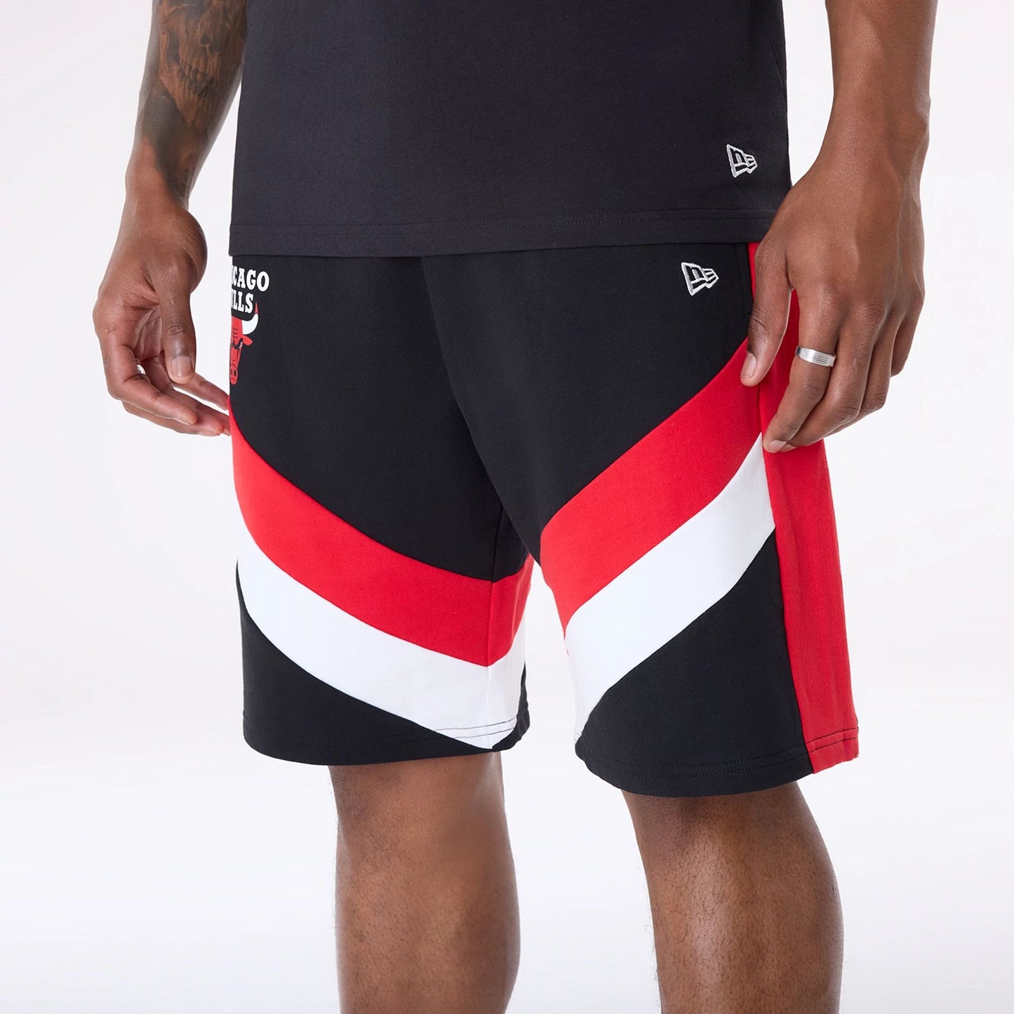 The Male model is wearing Chicago Bulls NBA Panel Black Shorts 6