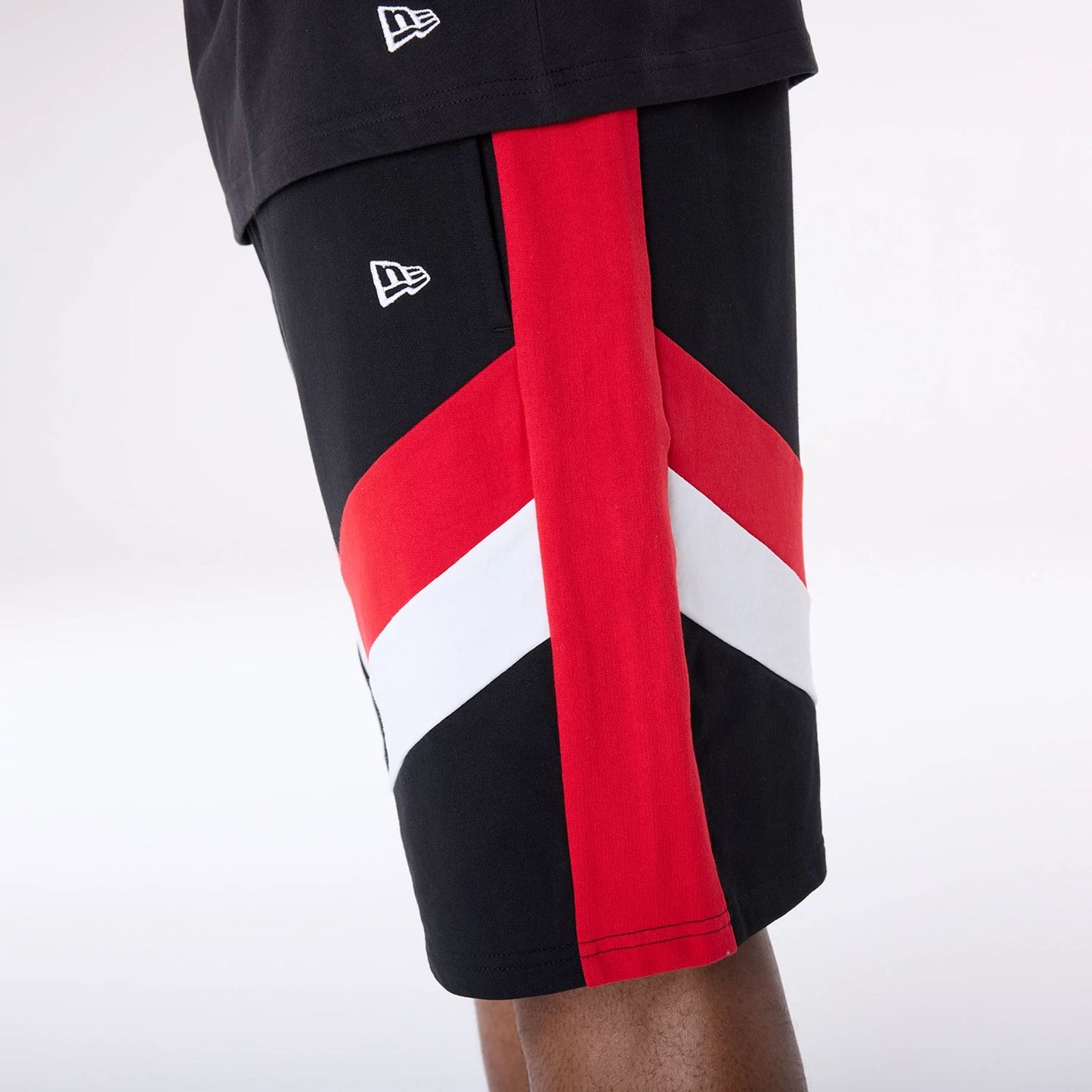 The Male model is wearing Chicago Bulls NBA Panel Black Shorts 4