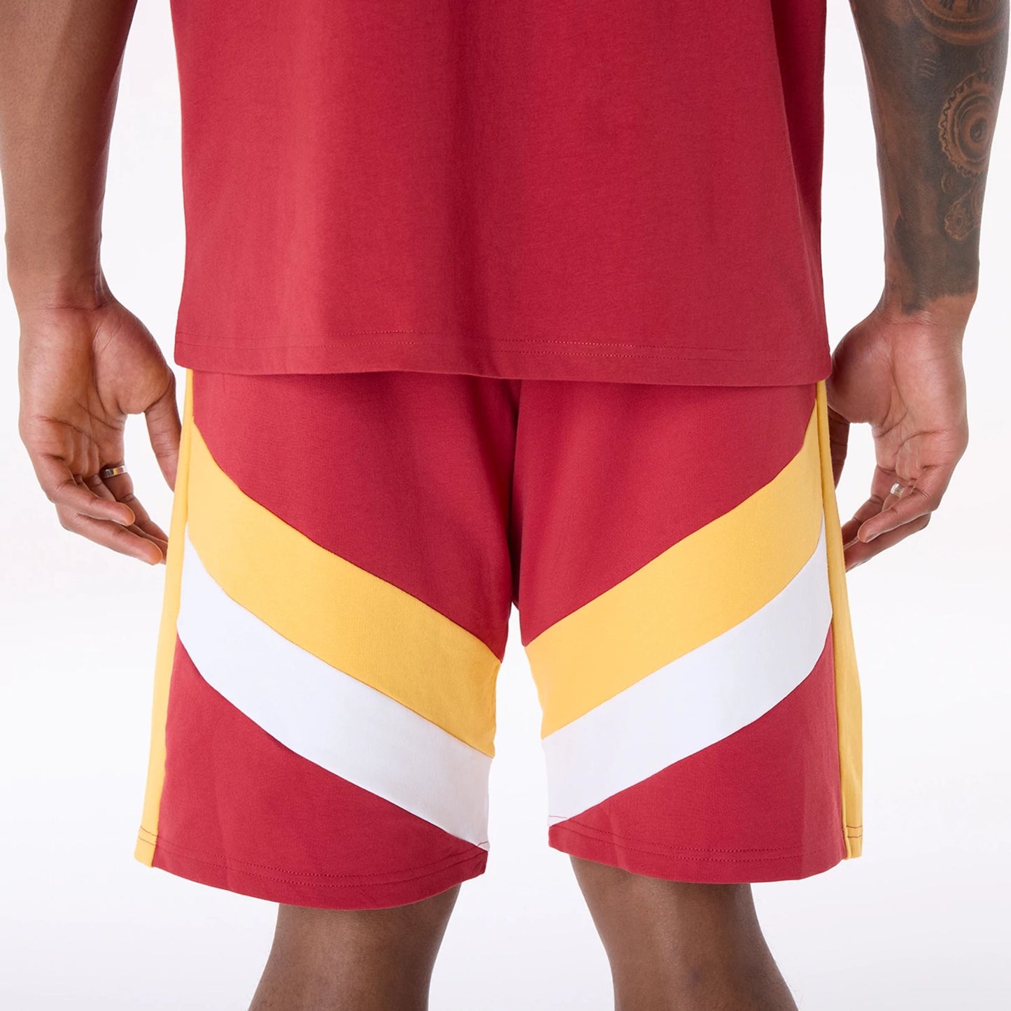 The Male model is wearing Miami Heat NBA Panel Dark Red Shorts 3