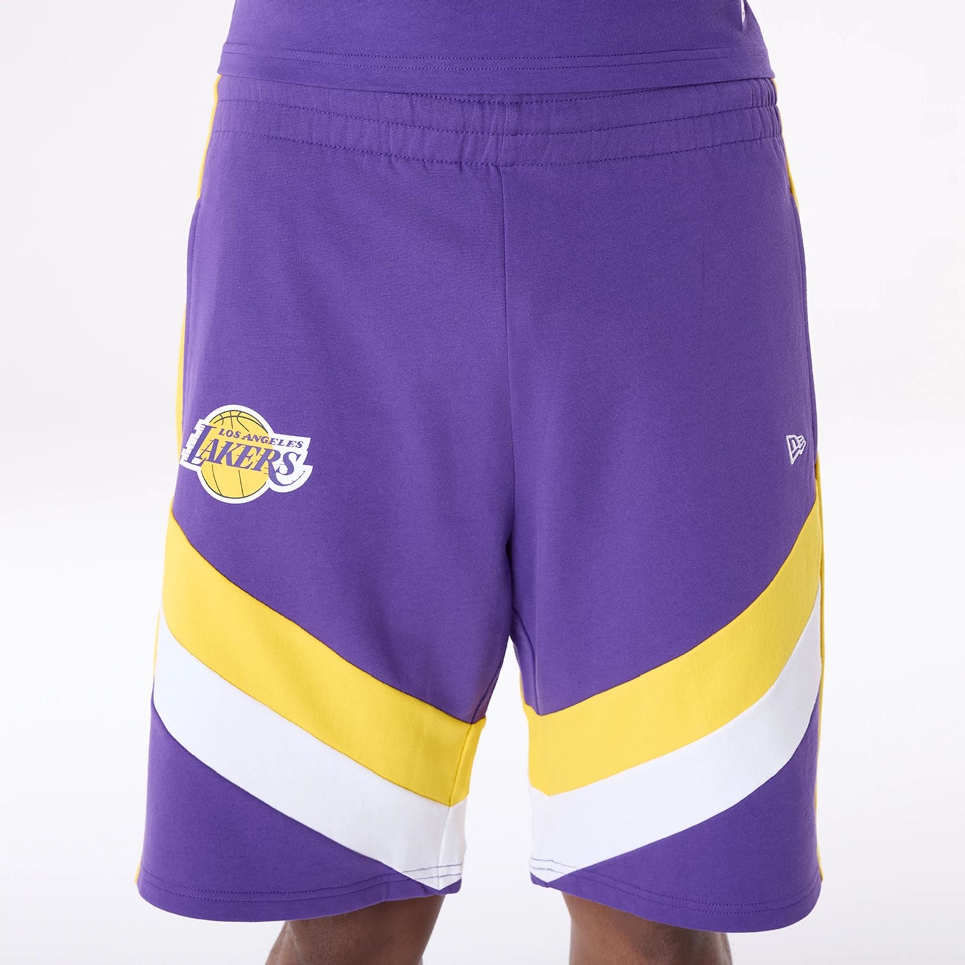 The Male model is wearing LA Lakers NBA Panel Purple Shorts 4