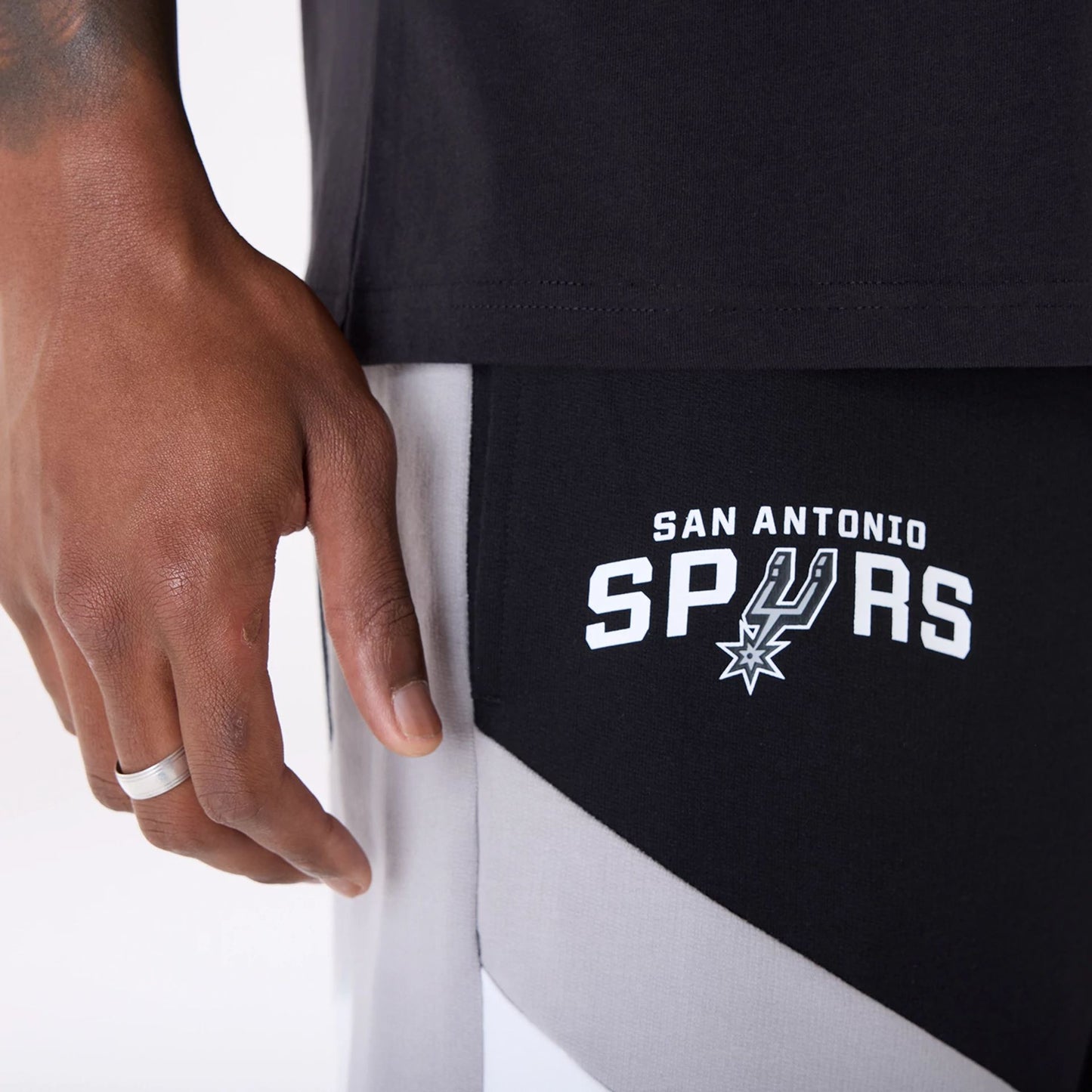 The Male model is wearing San Antonio Spurs NBA Panel Black Shorts 5