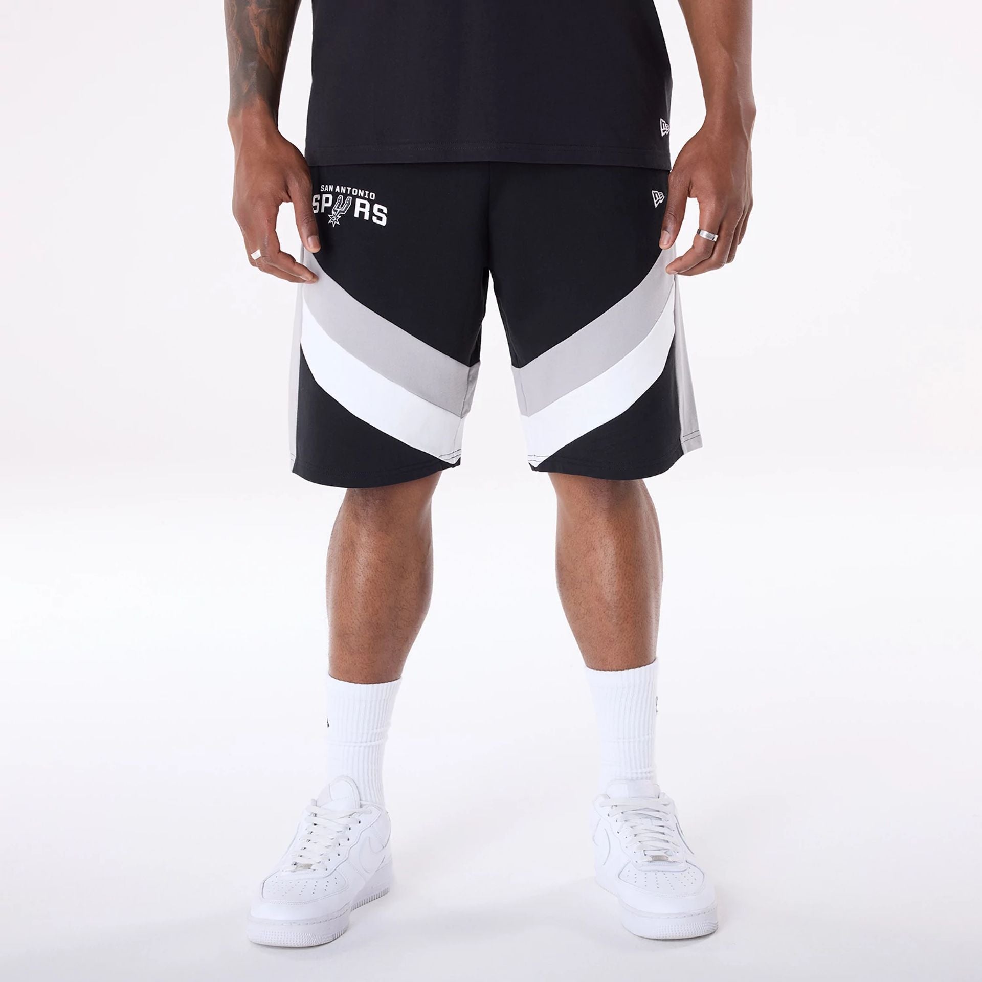 The Male model is wearing San Antonio Spurs NBA Panel Black Shorts 1