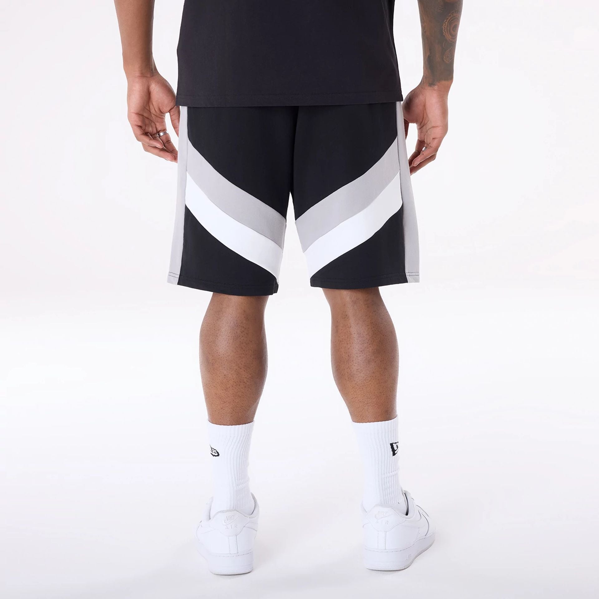 The Male model is wearing San Antonio Spurs NBA Panel Black Shorts 2