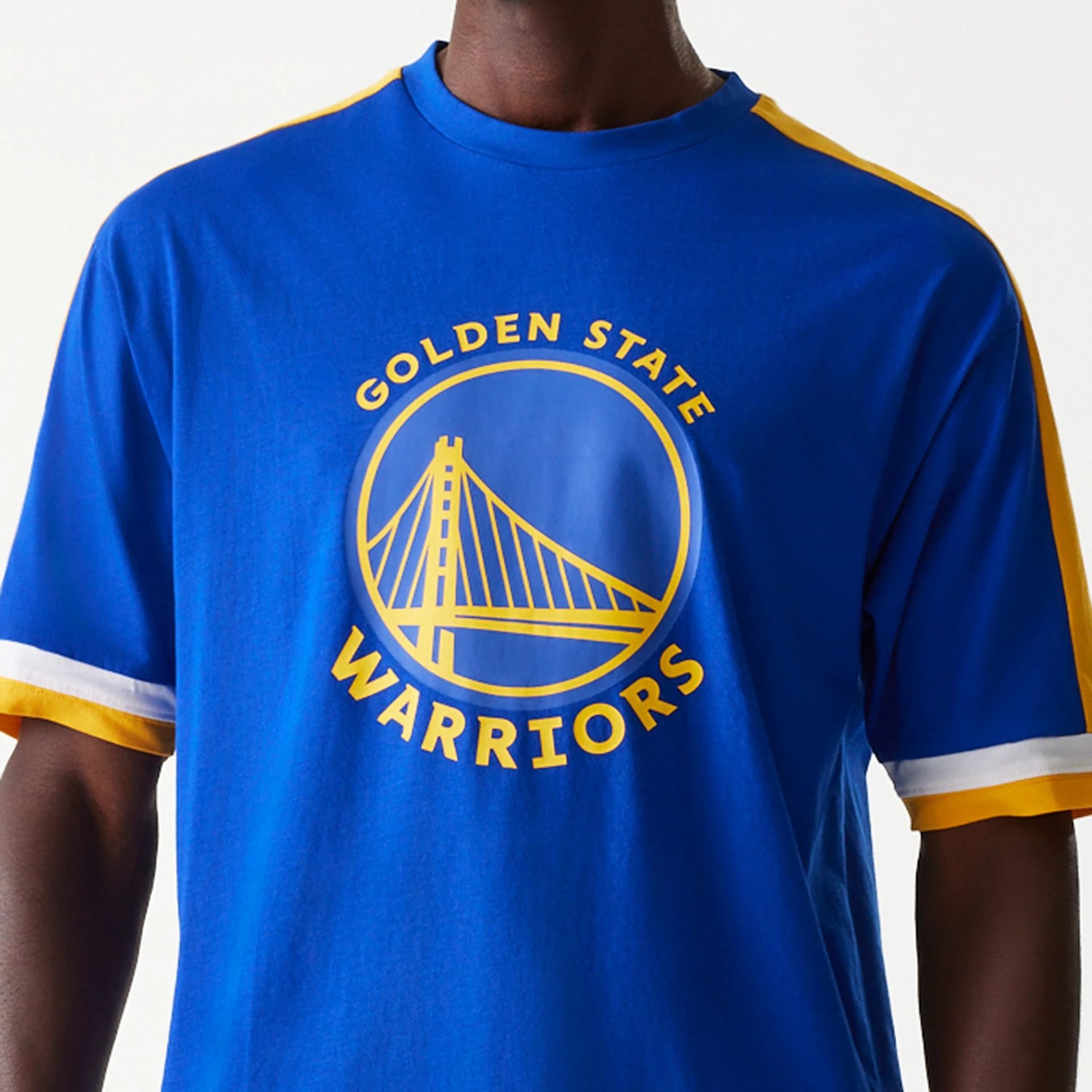 The Male model is wearing Golden State Warriors NBA Panel Blue Oversized T-Shirt 3