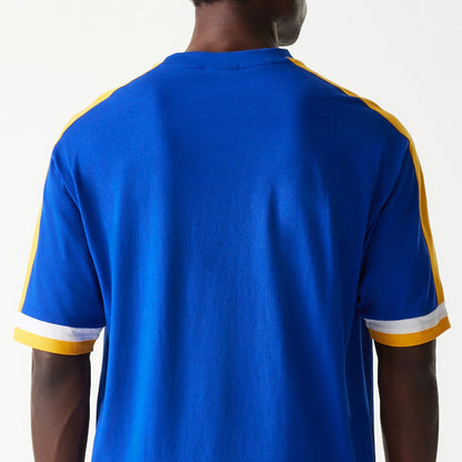 The Male model is wearing Golden State Warriors NBA Panel Blue Oversized T-Shirt 7