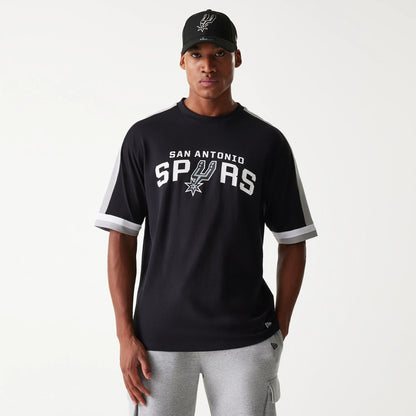 The Male model is wearing San Antonio Spurs NBA Panel Black Oversized T-Shirt 1