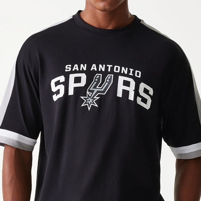 The Male model is wearing San Antonio Spurs NBA Panel Black Oversized T-Shirt 3