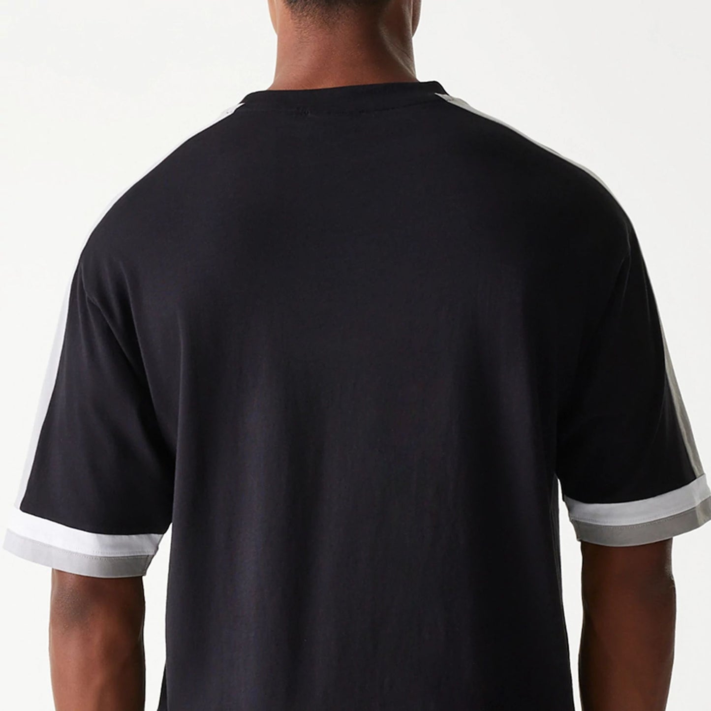 The Male model is wearing San Antonio Spurs NBA Panel Black Oversized T-Shirt 7