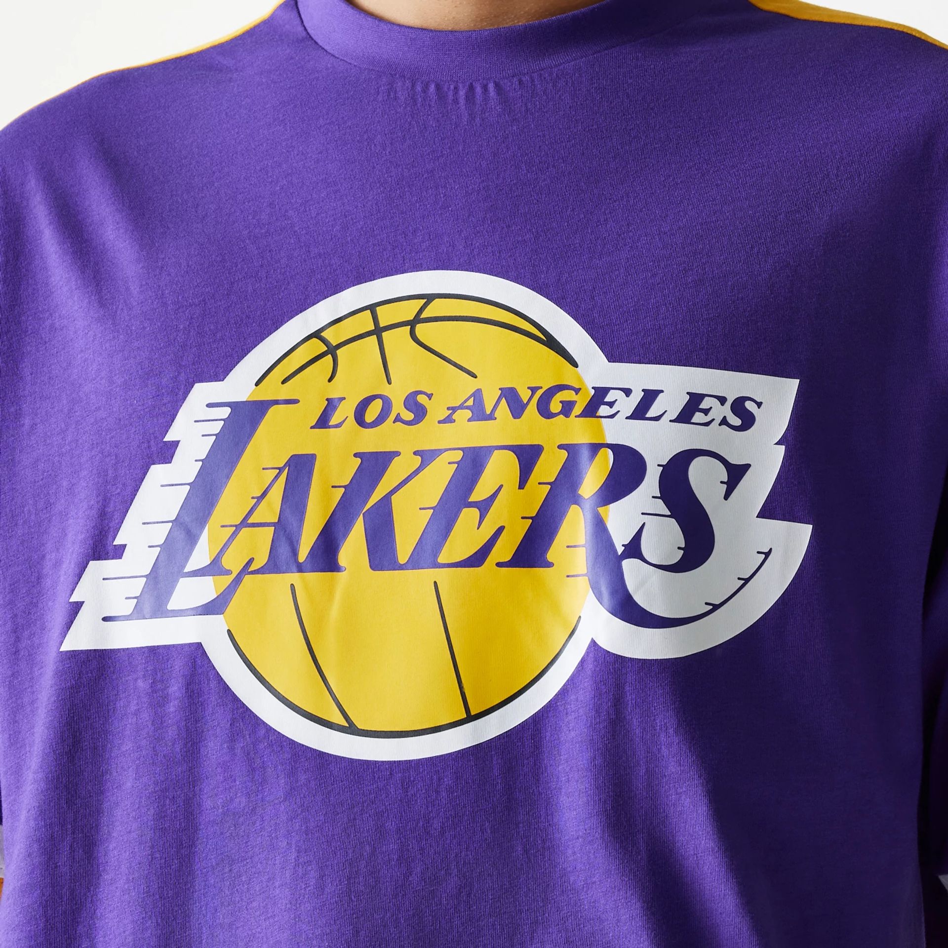 The Male model is wearing LA Lakers NBA Panel Purple Oversized T-Shirt 4