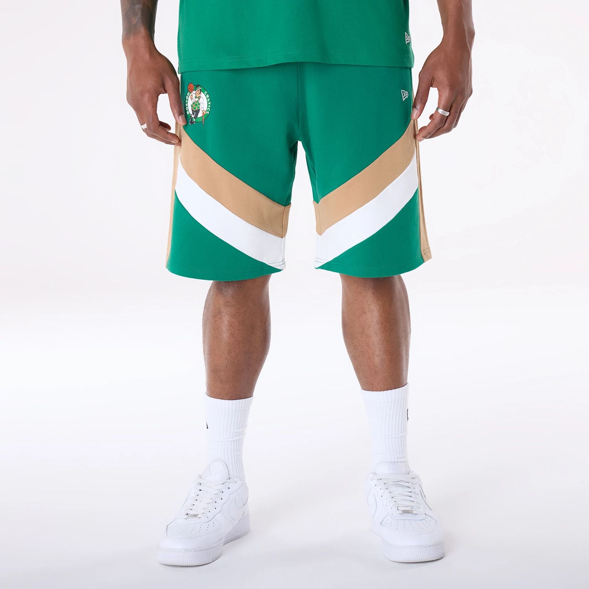 The Male model is wearing Boston Celtics NBA Panel Green Shorts 1