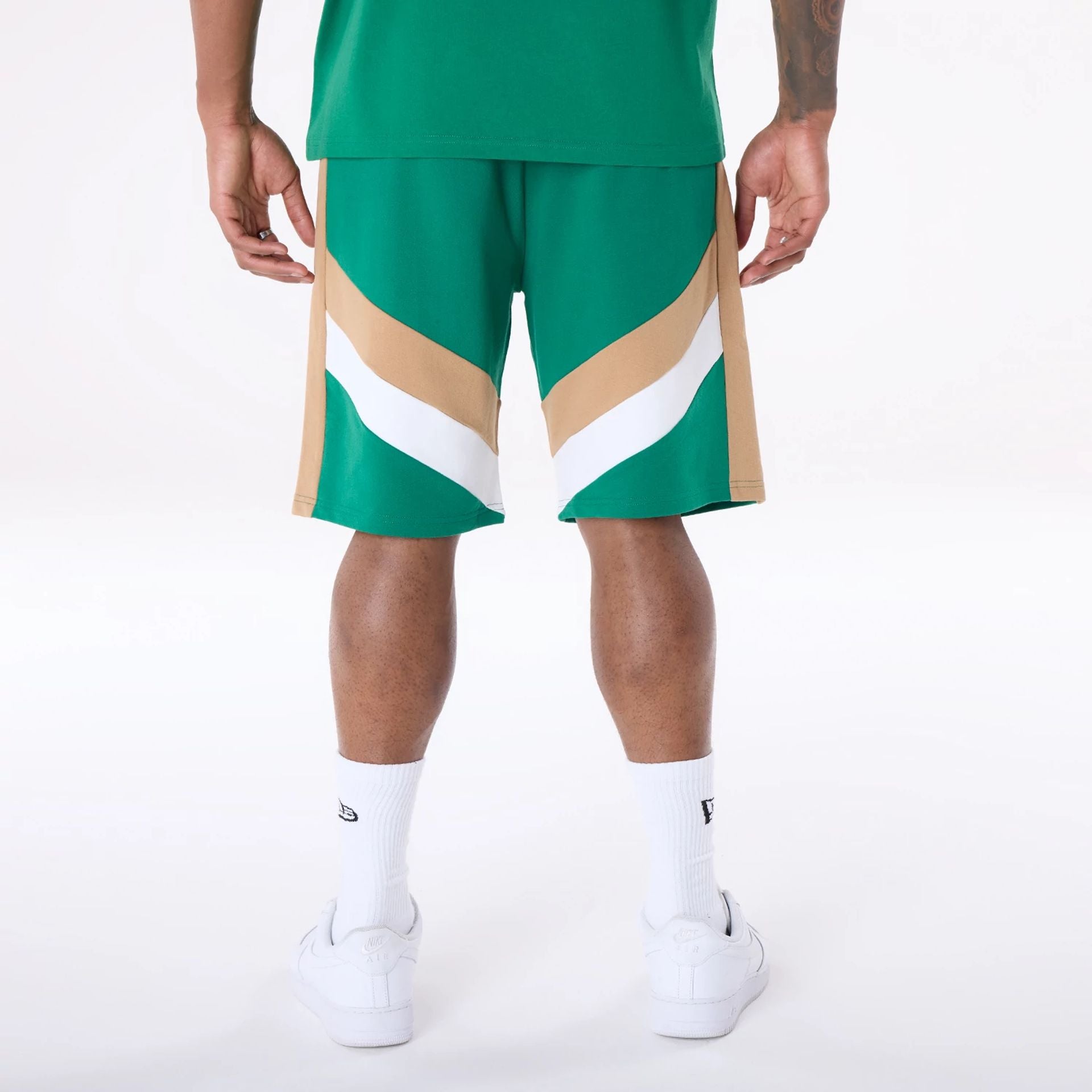 The Male model is wearing Boston Celtics NBA Panel Green Shorts 2