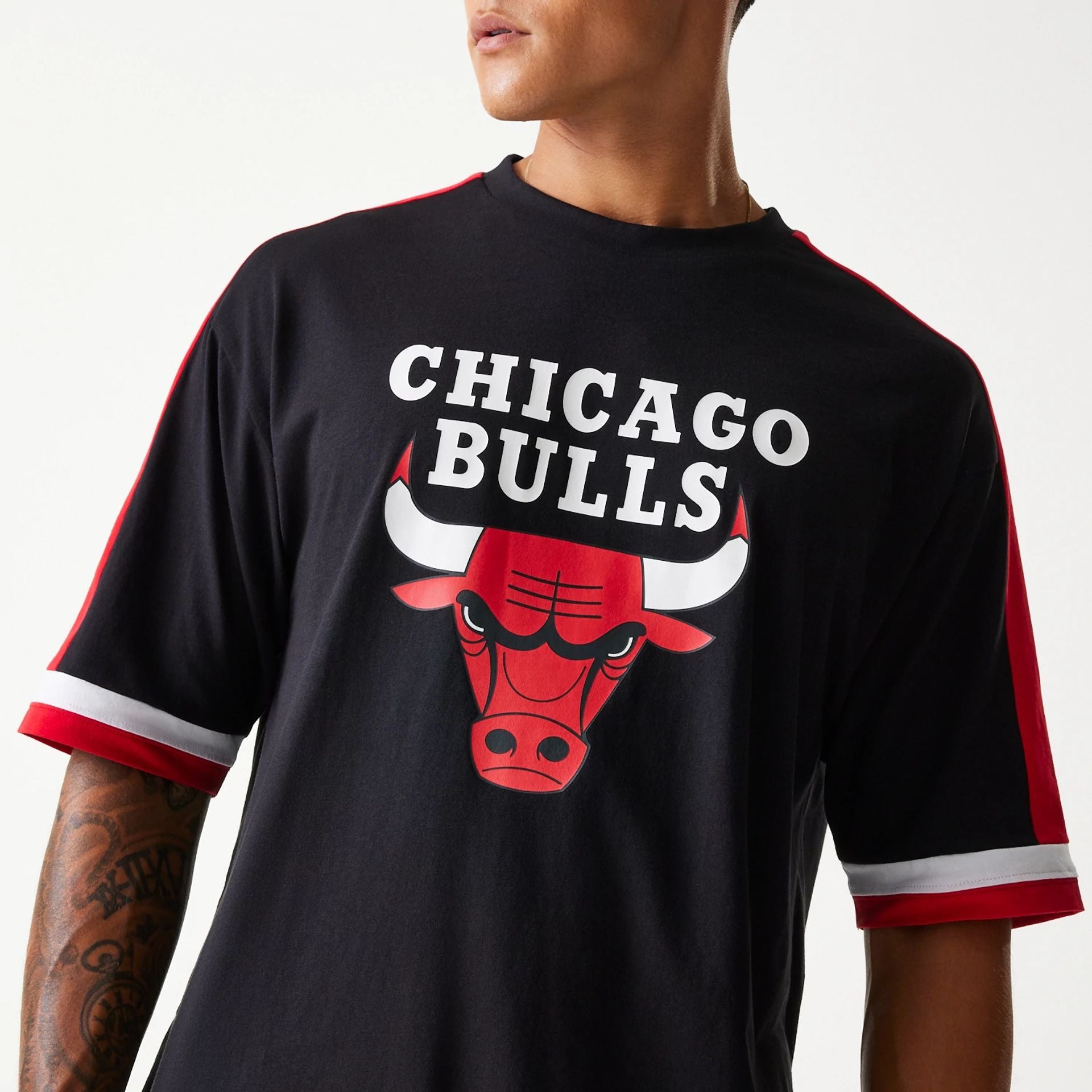 The Male model is wearing Chicago Bulls NBA Panel Black Oversized T-Shirt 4