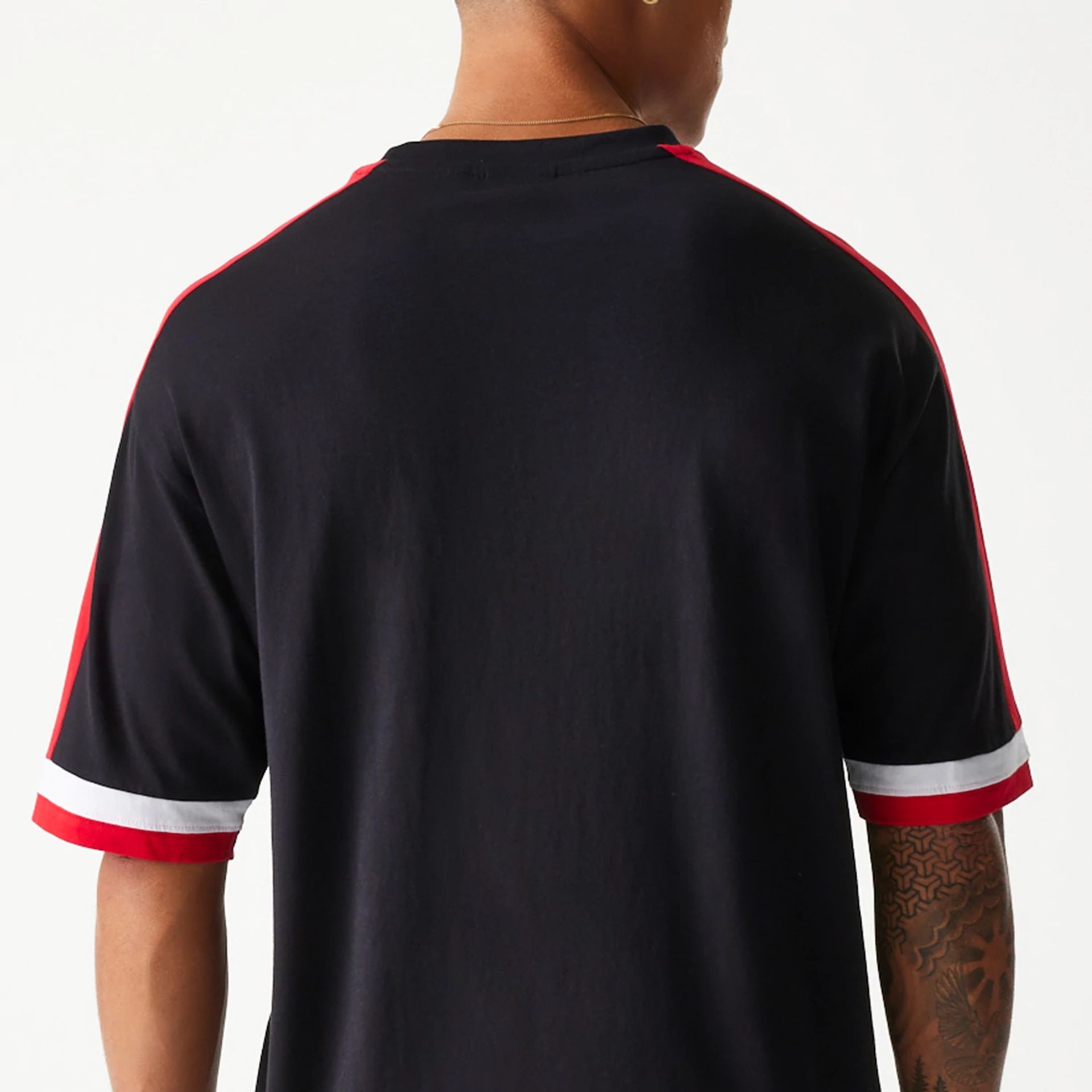 The Male model is wearing Chicago Bulls NBA Panel Black Oversized T-Shirt 7