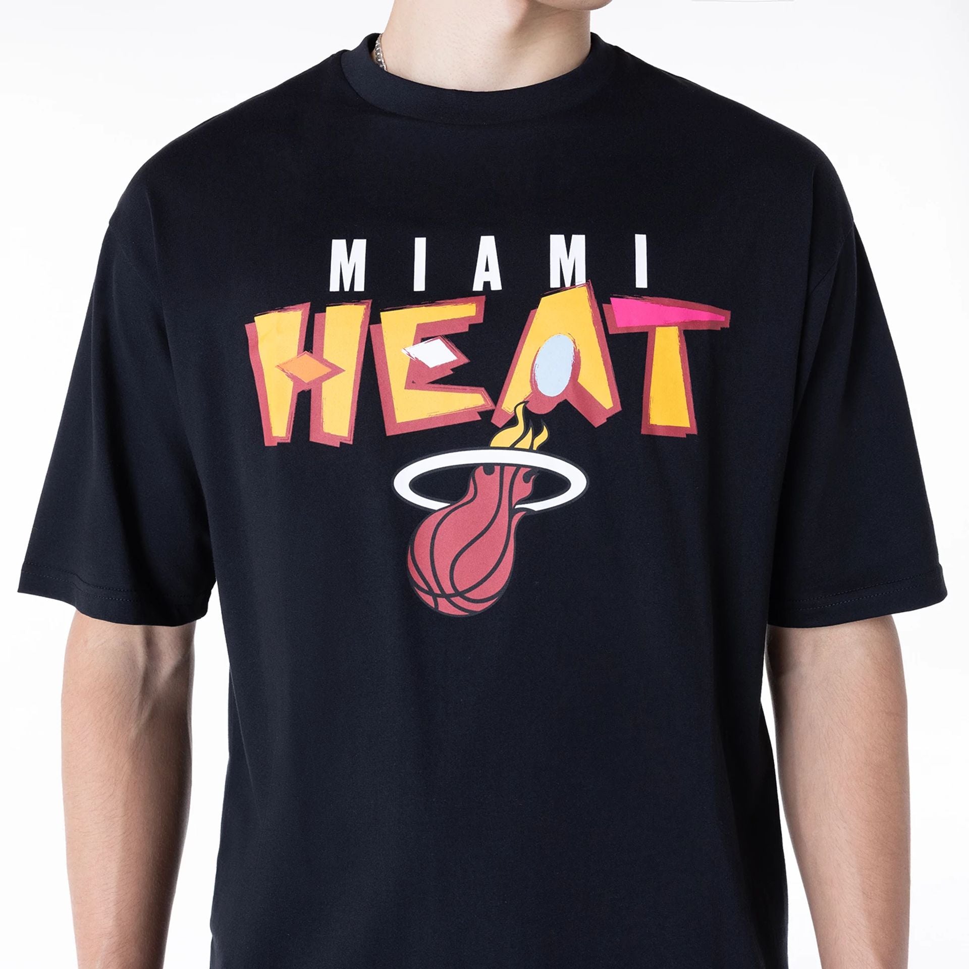 The Male model is wearing Miami Heat NBA Graphic Black Oversized T-Shirt 3