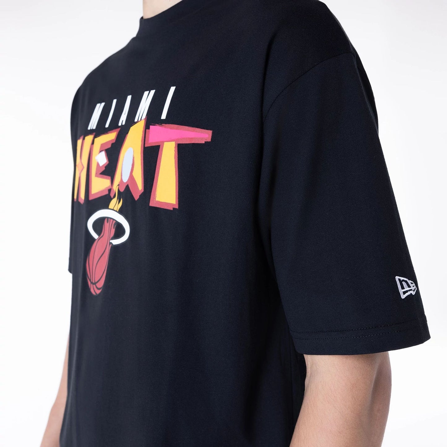 The Male model is wearing Miami Heat NBA Graphic Black Oversized T-Shirt 6