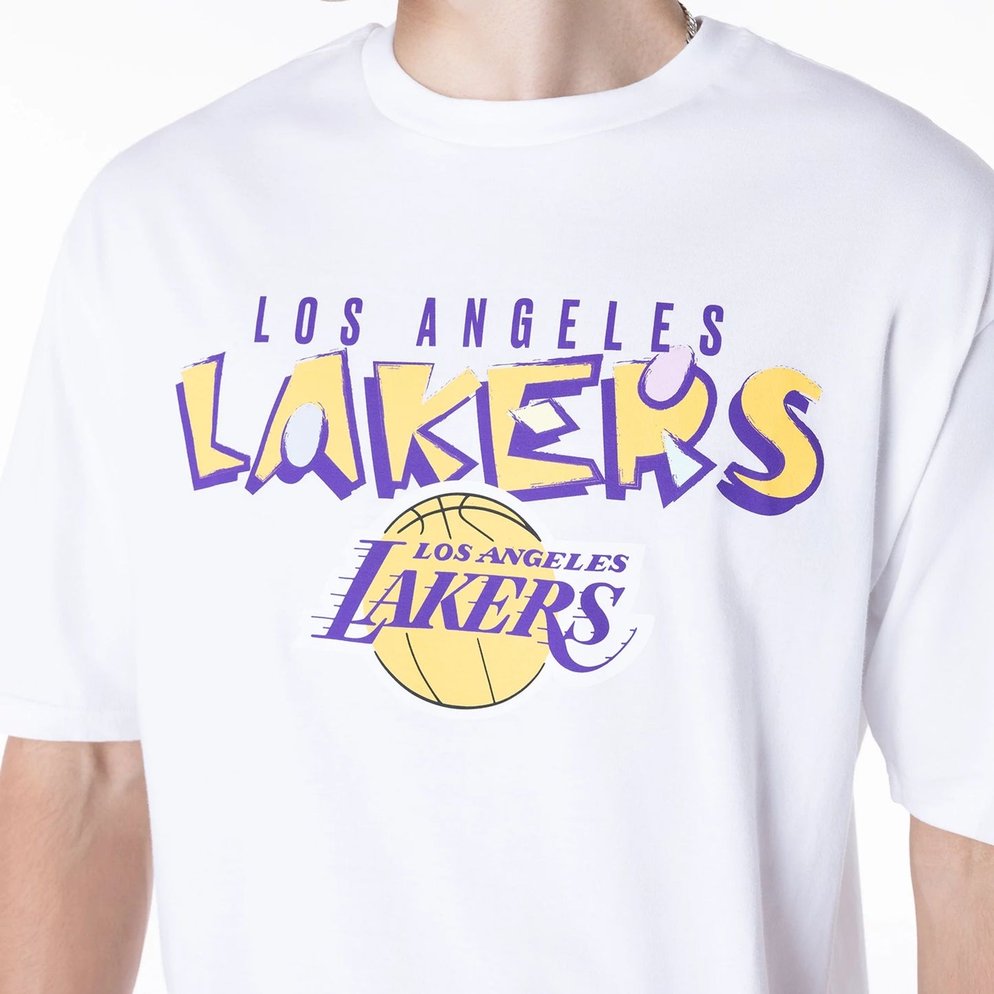 The Male model is wearing LA Lakers NBA Graphic White Oversized T-Shirt 5