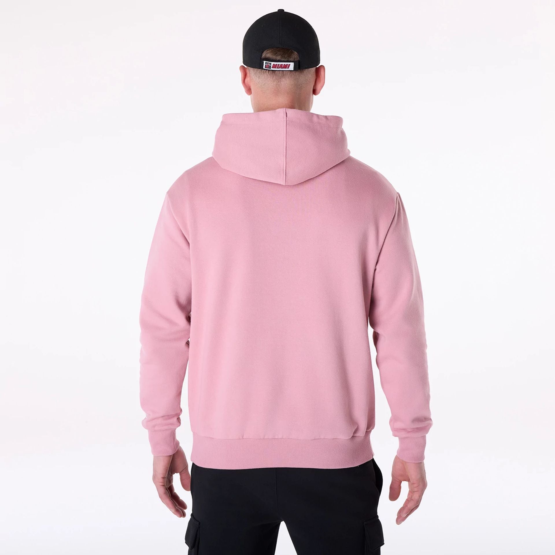 The Male model is wearing Miami Heat NBA Graphic Dark Pink Oversized Pullover Hoodie 2