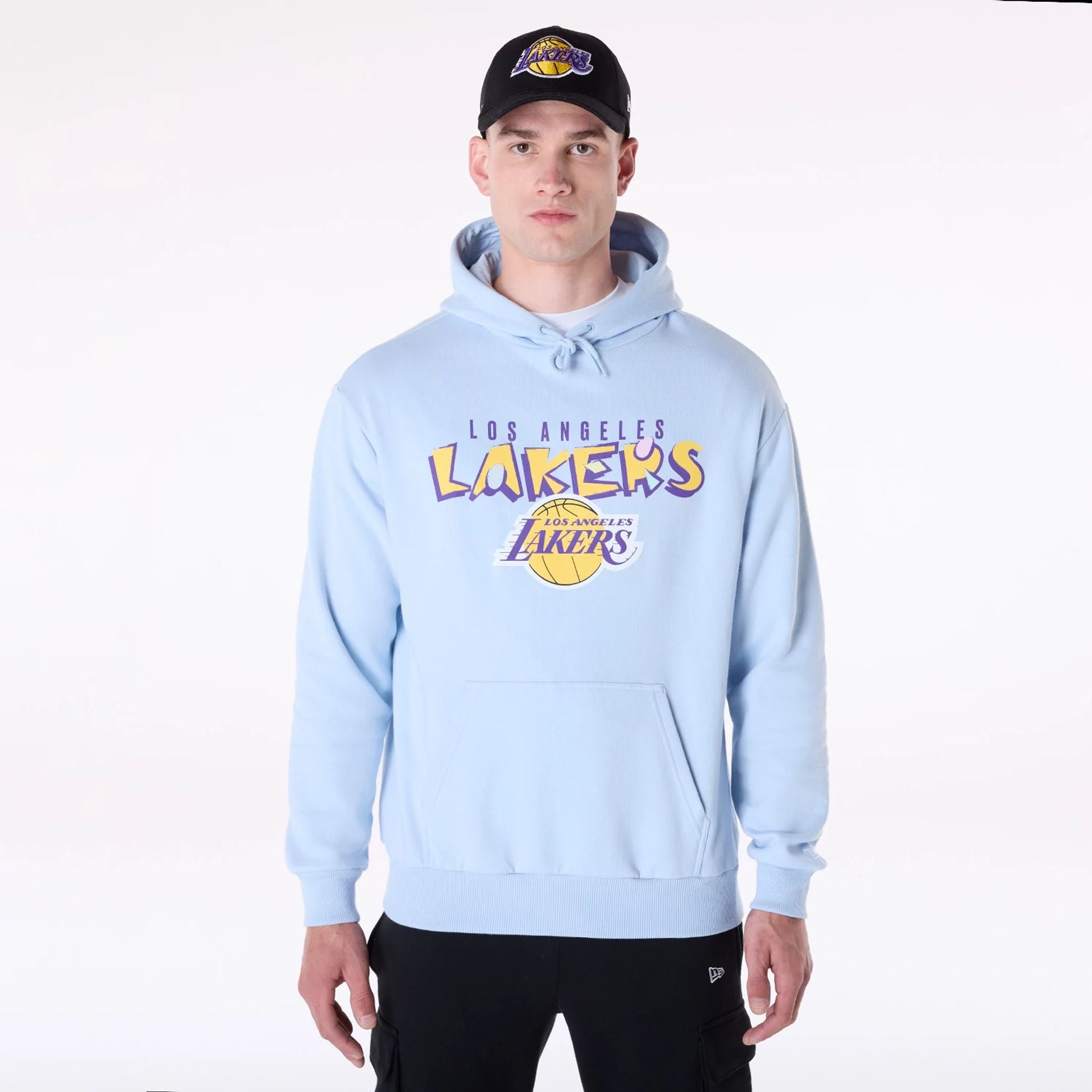 The Male model is wearing LA Lakers NBA Graphic Pastel Blue Oversized Pullover Hoodie 1