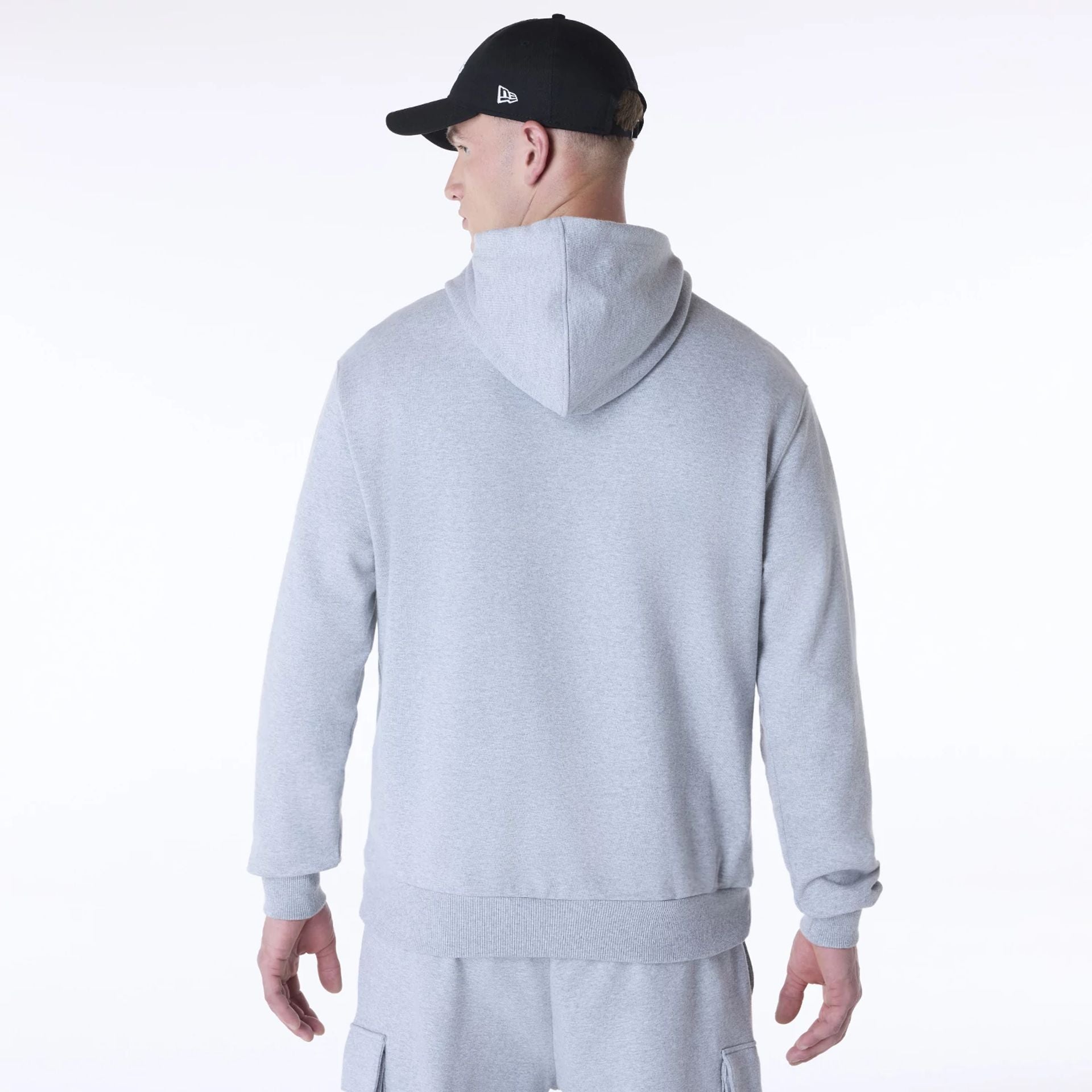 The Male model is wearing New Era Script Grey Pullover Hoodie 2