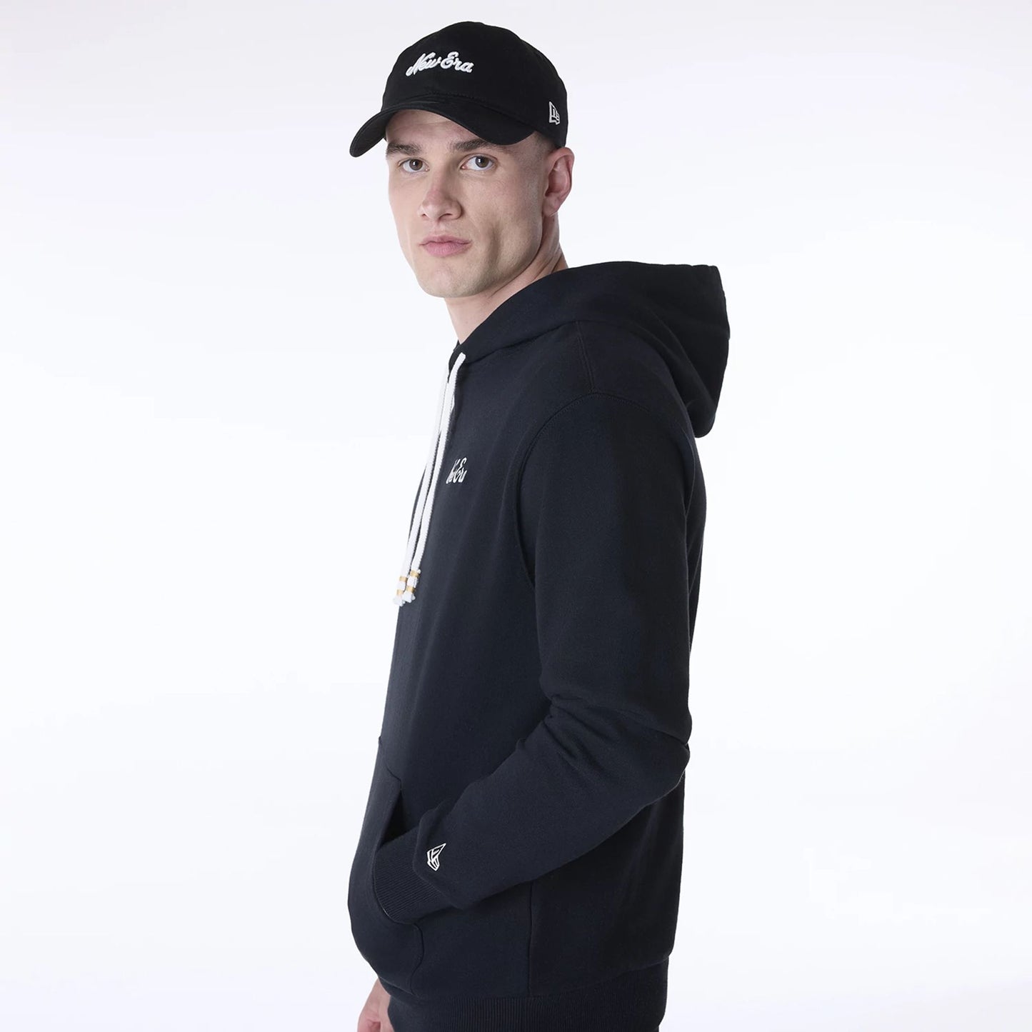 The Male model is wearing New Era Script Black Pullover Hoodie 3