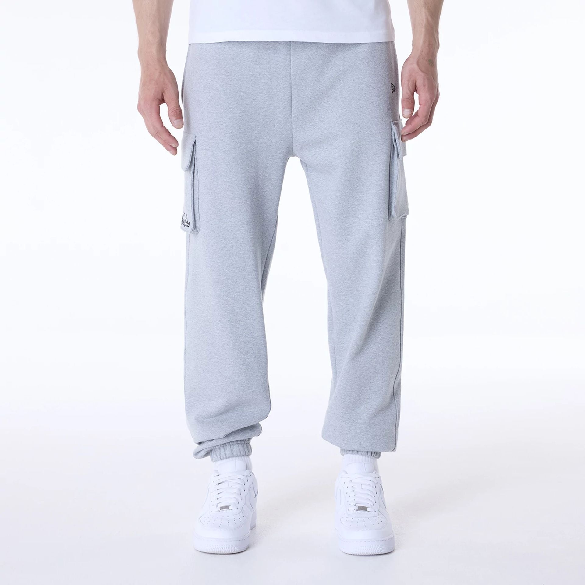 The Male model is wearing New Era Script Grey Fleece Joggers 1