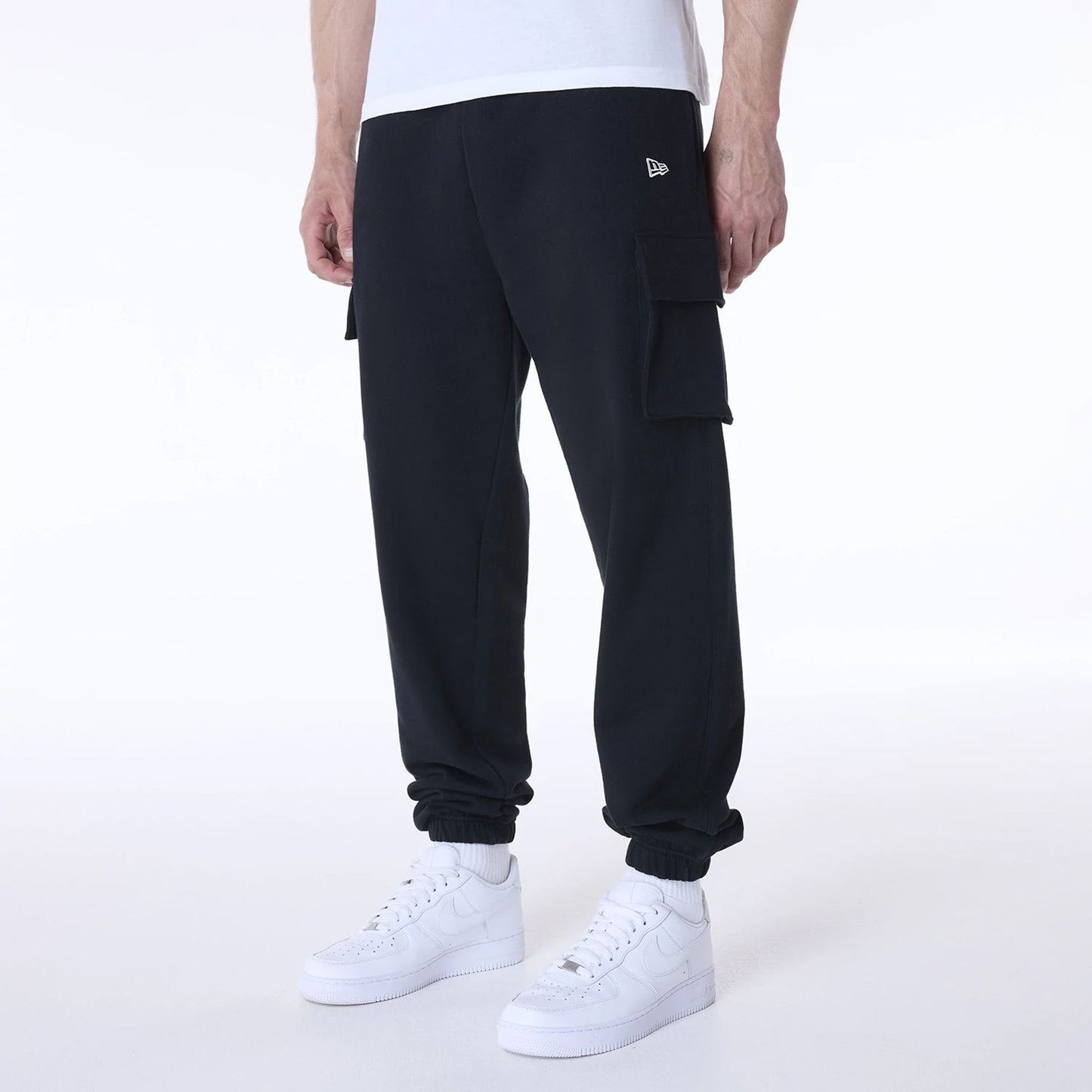 The Male model is wearing New Era Script Black Fleece Joggers 2