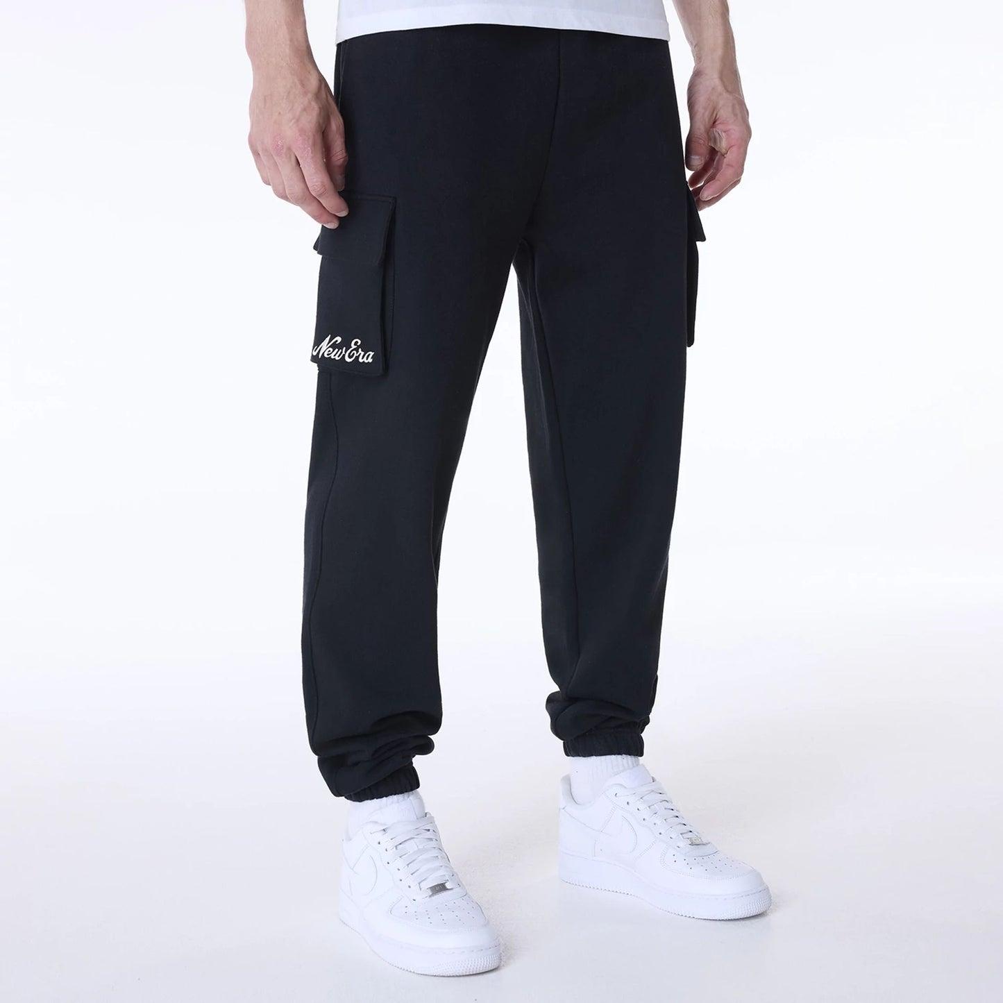 The Male model is wearing New Era Script Black Fleece Joggers 1