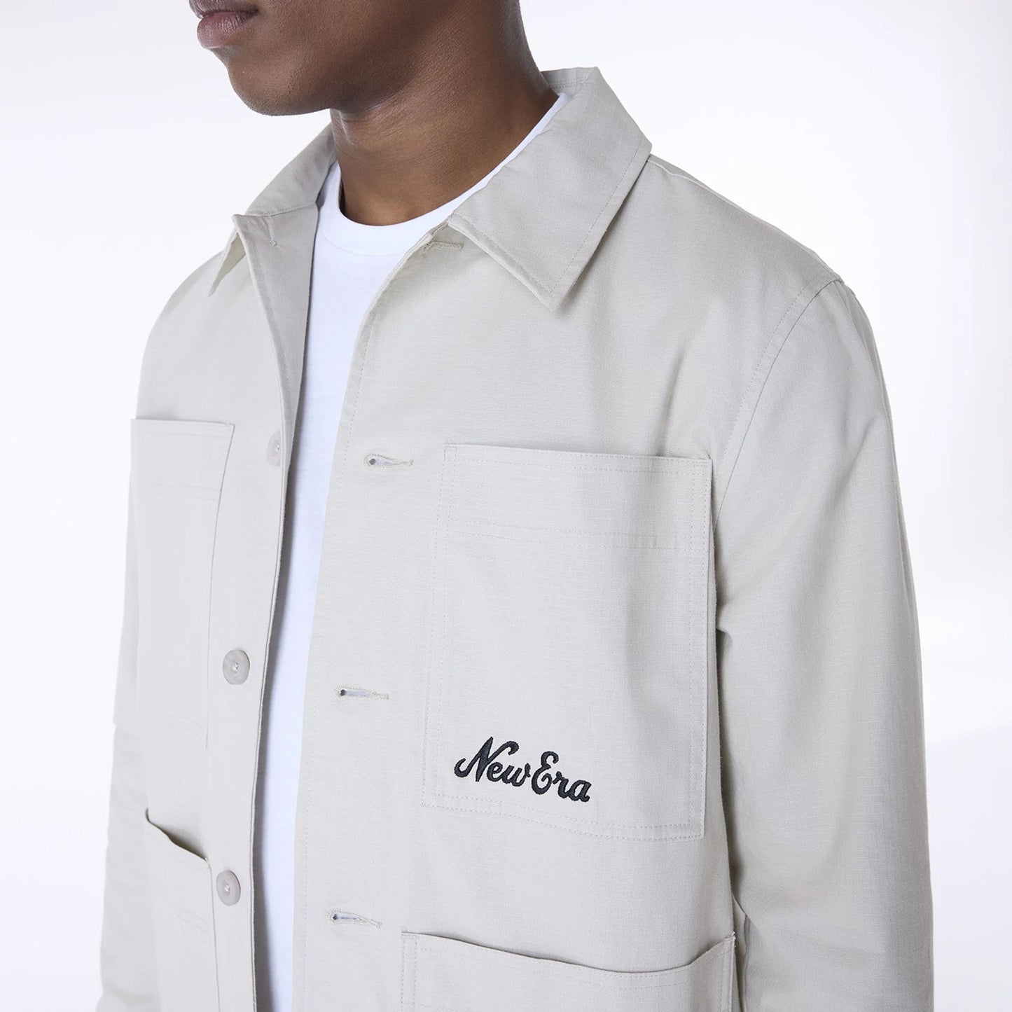 The Male model is wearing New Era Essential Cream Shacket 3