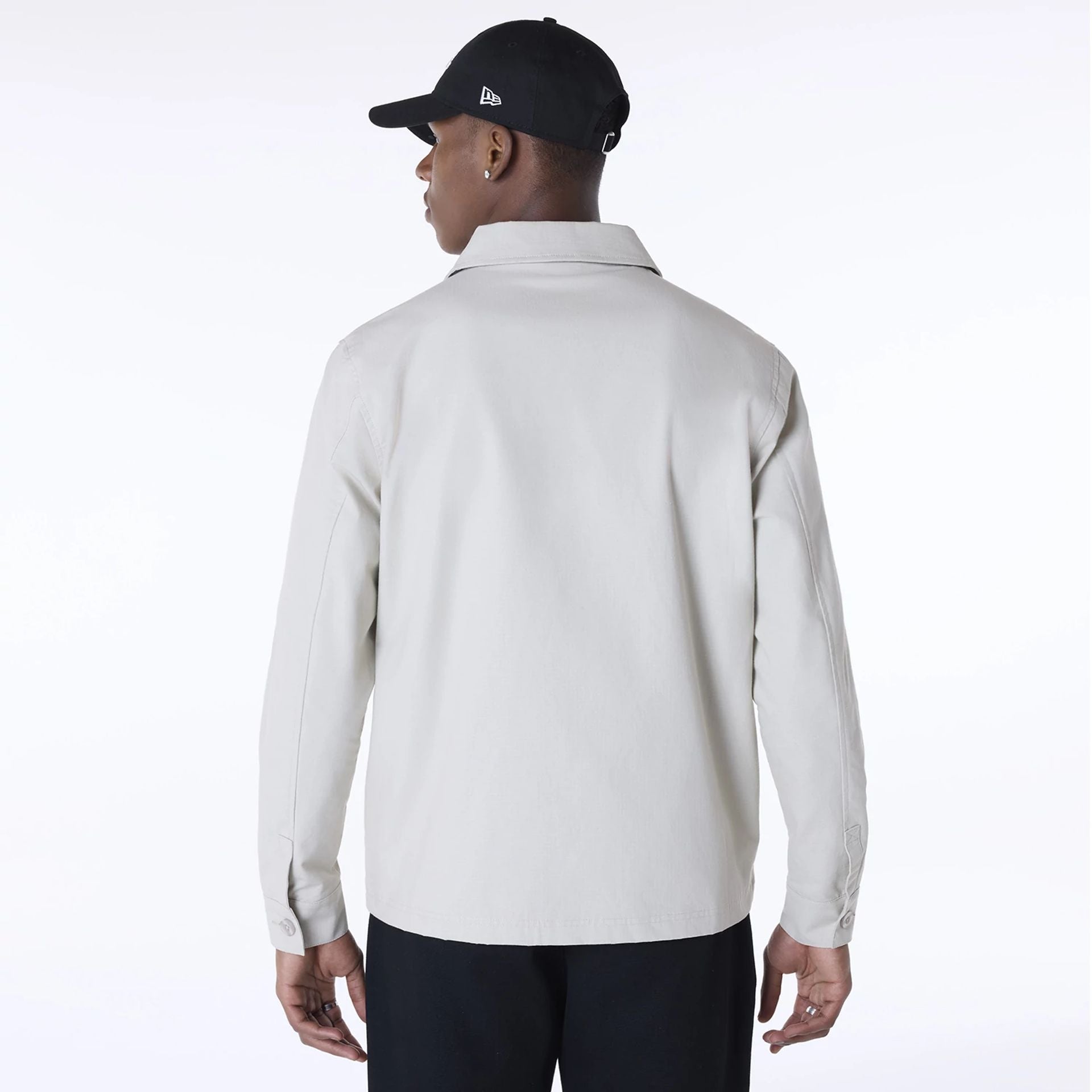 The Male model is wearing New Era Essential Cream Shacket 2