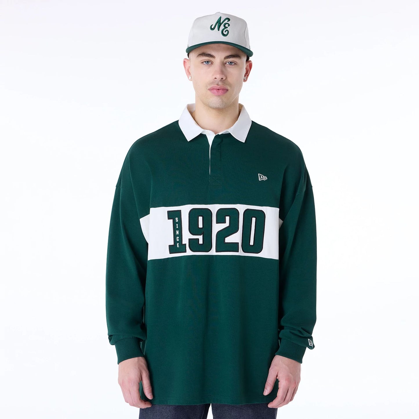 The Male model is wearing New Era Drop Shoulder Dark Green Rugby 3