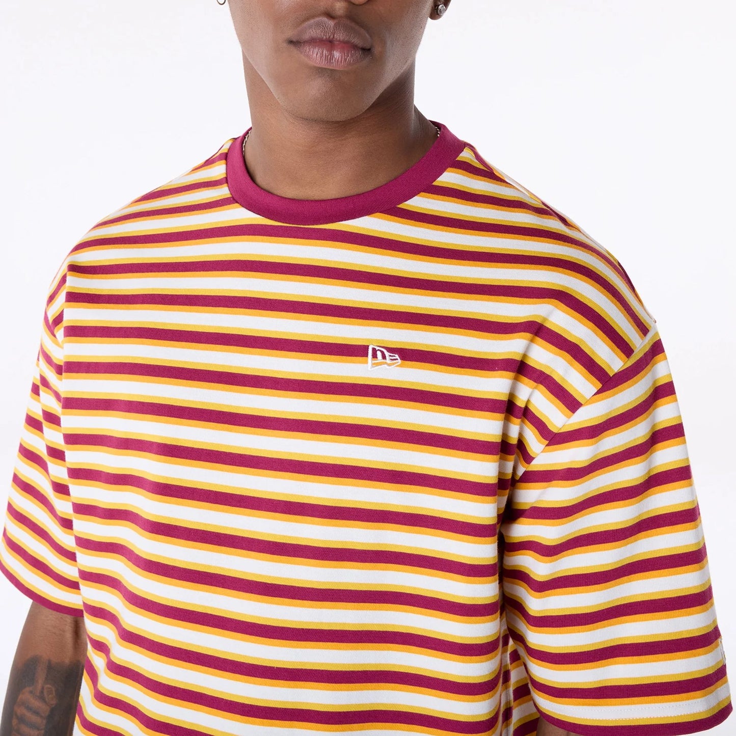 The Male model is wearing New Era Stripe Dark Red T-Shirt 6