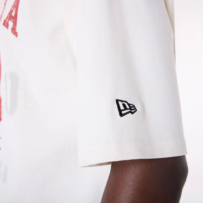 The Male model is wearing New Era Graphic Open White Oversized T-Shirt 7