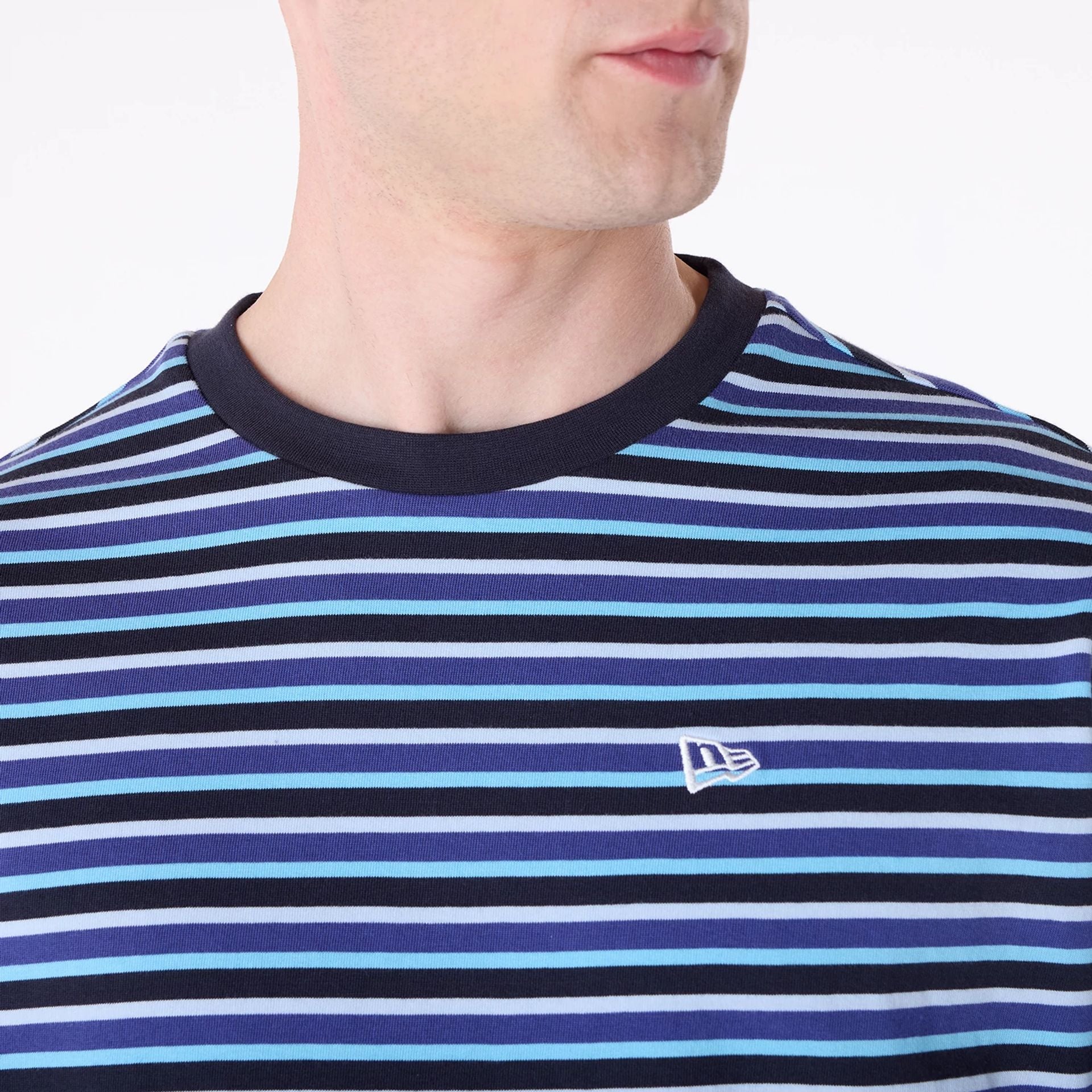 The Male model is wearing New Era Stripe Pastel Blue T-Shirt 5