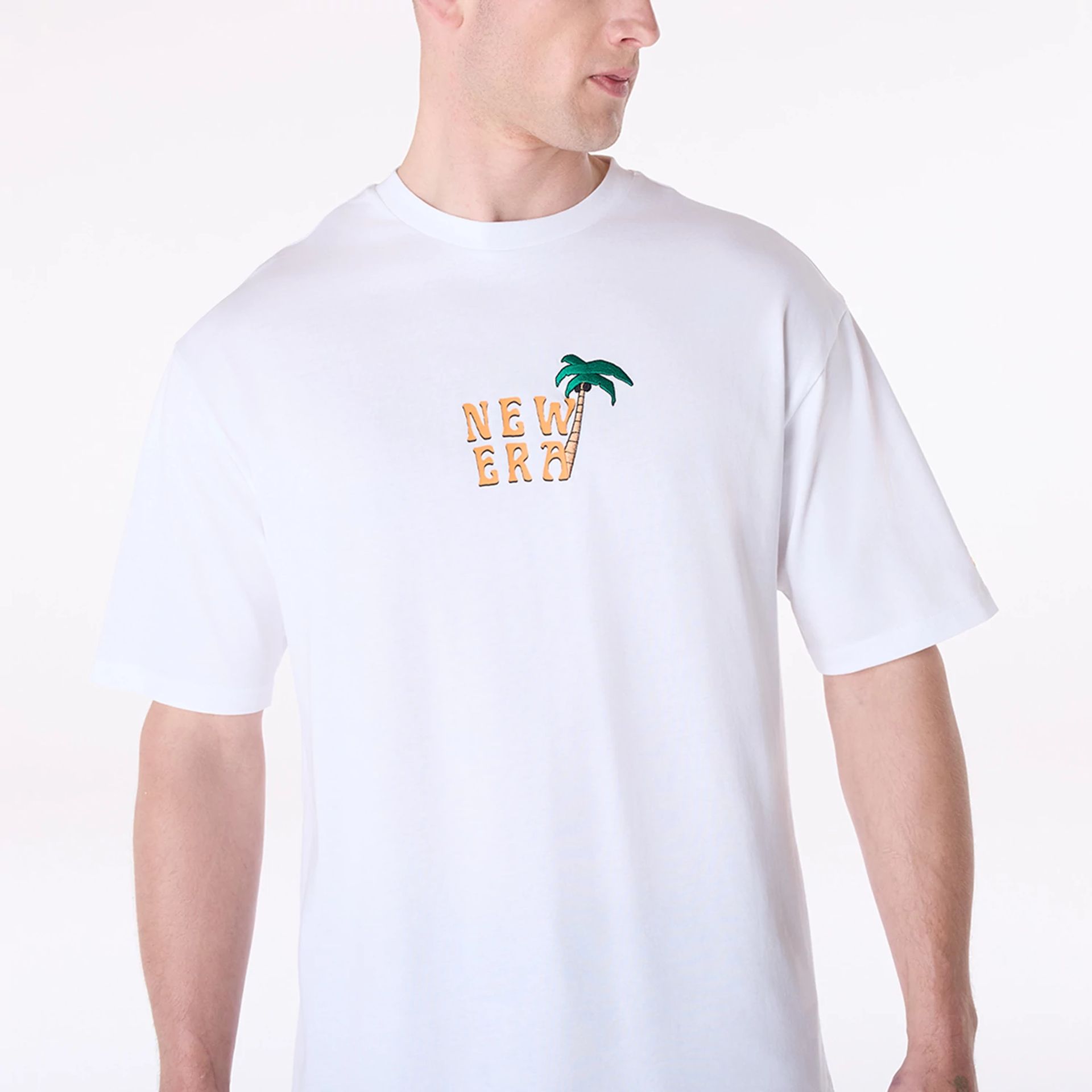 The Male model is wearing New Era Drink Graphic White Oversized T-Shirt 8