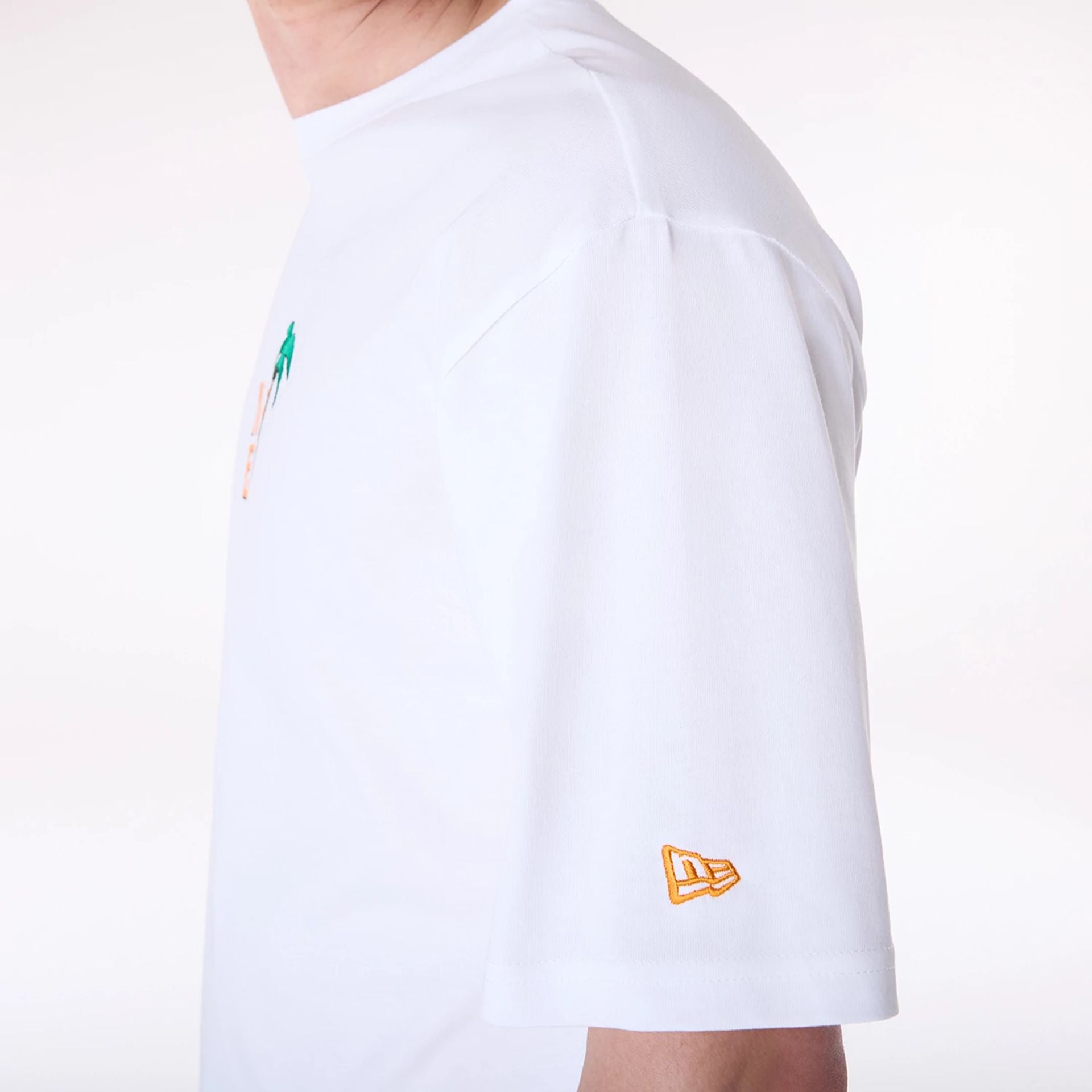 The Male model is wearing New Era Drink Graphic White Oversized T-Shirt 7