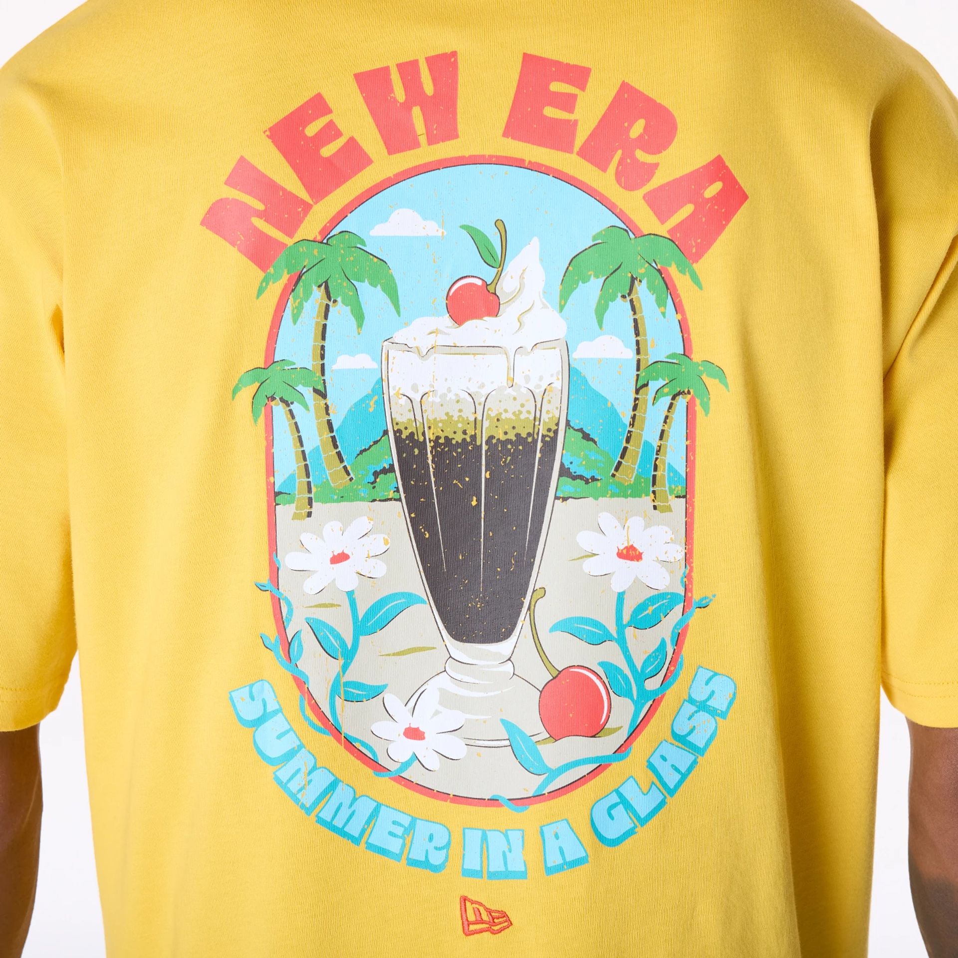 The Male model is wearing New Era Drink Graphic Yellow Oversized T-Shirt 4