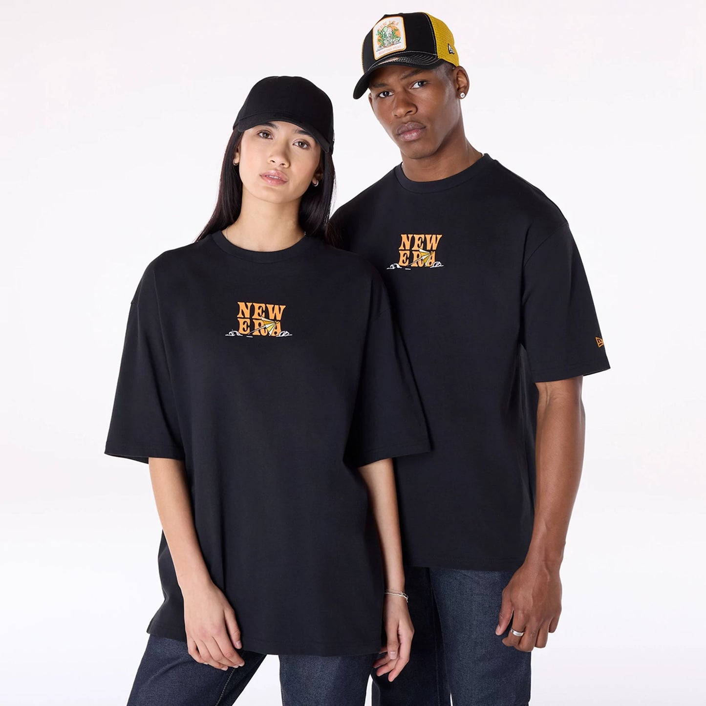 The Male model is wearing New Era Drink Graphic Black Oversized T-Shirt 1