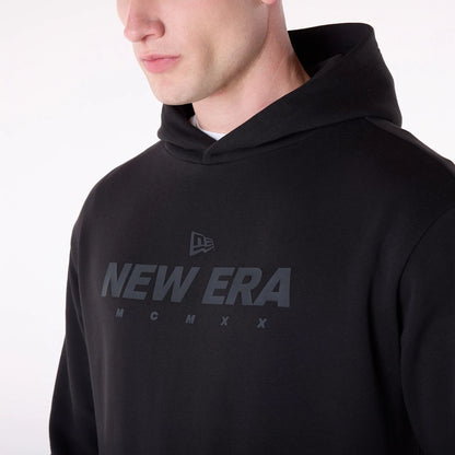 The Male model is wearing New Era Flag Black Oversized Pullover Hoodie 4