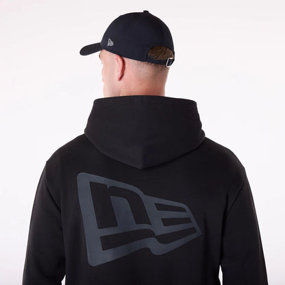 The Male model is wearing New Era Flag Black Oversized Pullover Hoodie 3