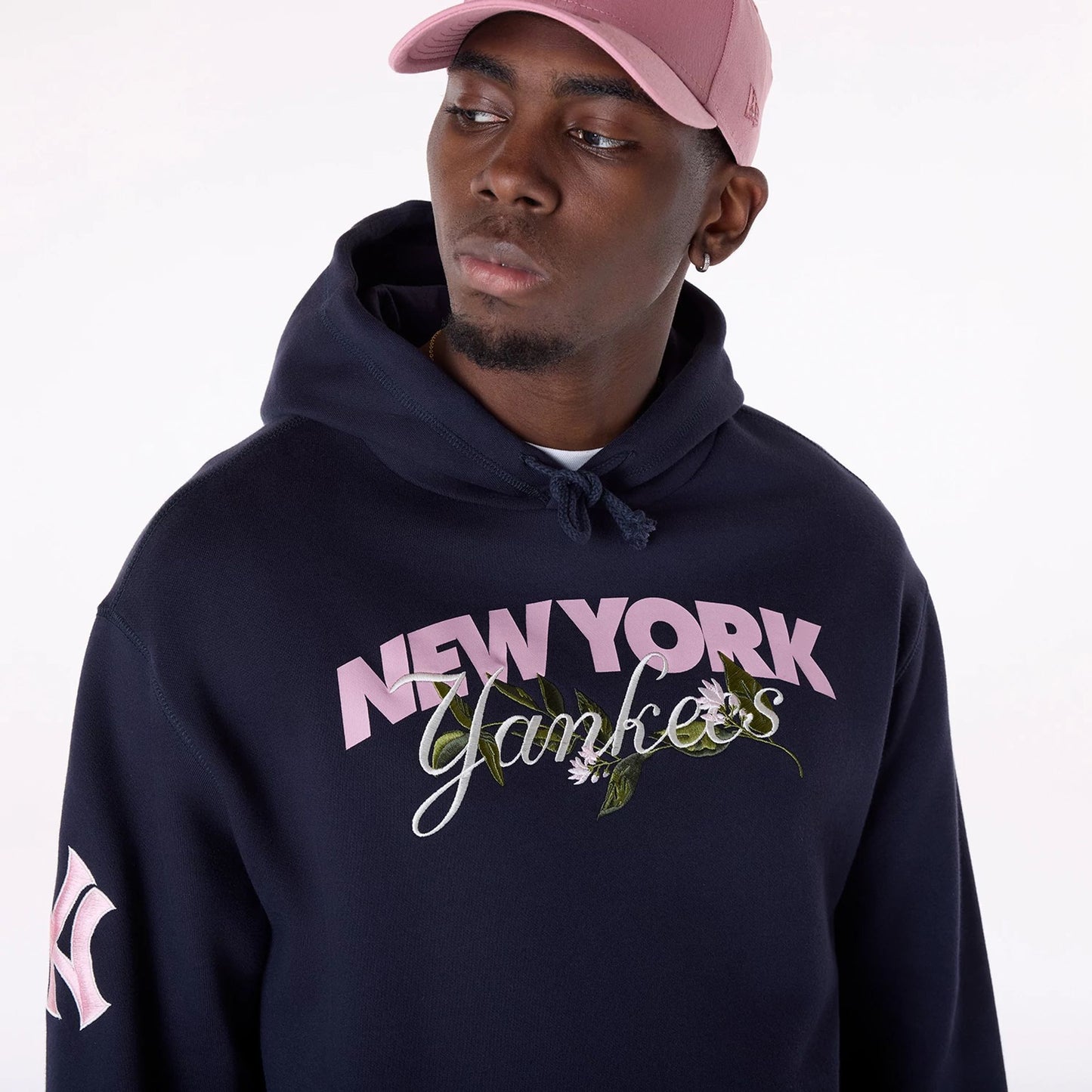 The Male model is wearing New York Yankees MLB Floral Navy Pullover Hoodie 3