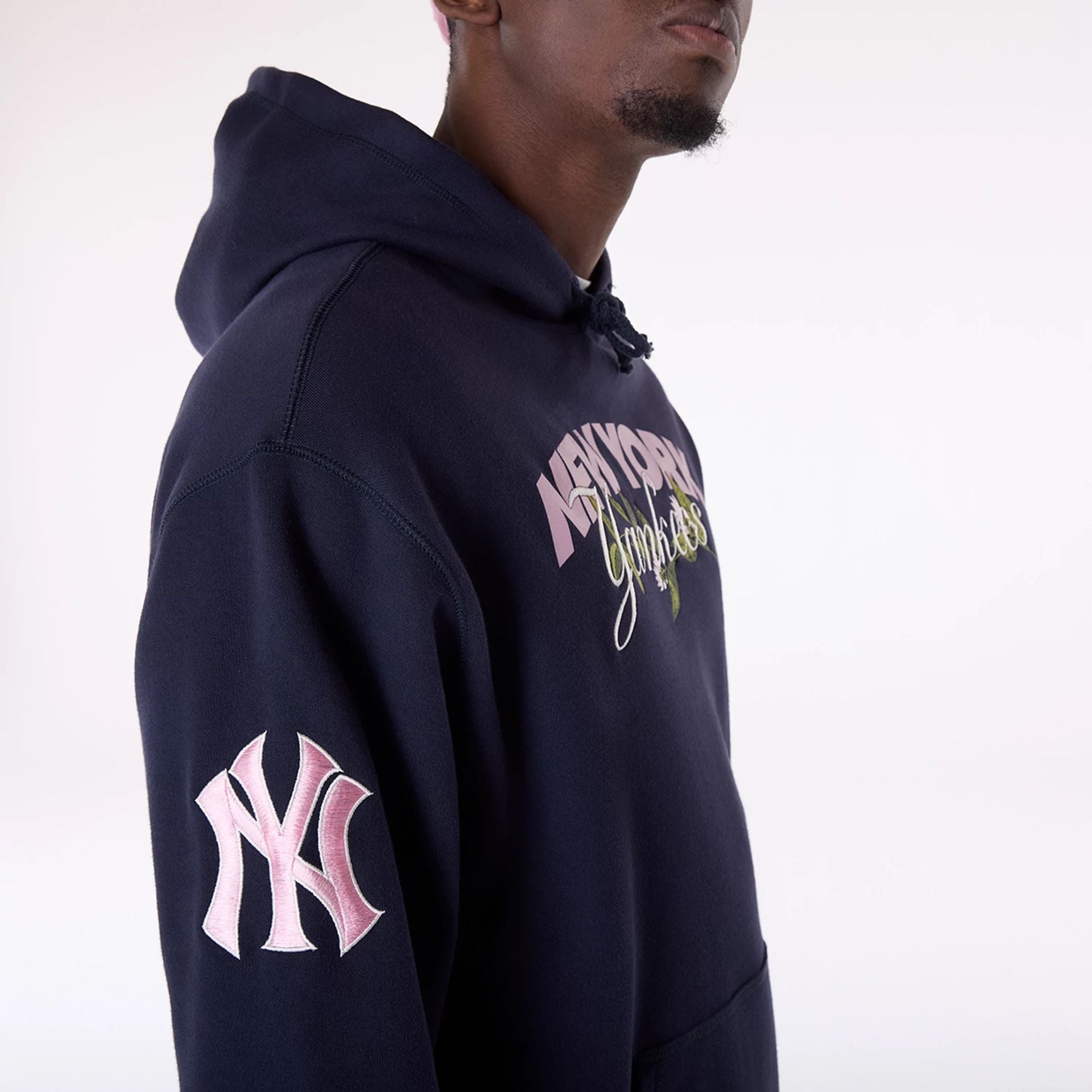 The Male model is wearing New York Yankees MLB Floral Navy Pullover Hoodie 4