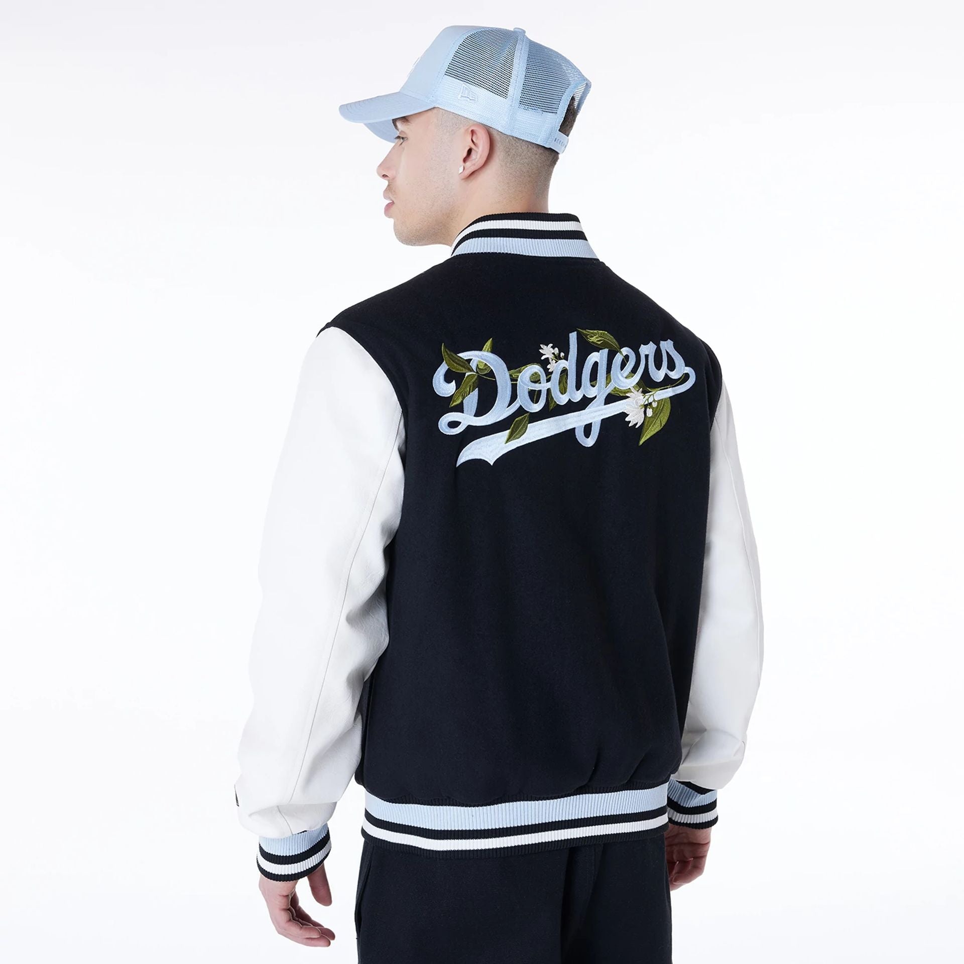 The Male model is wearing LA Dodgers MLB Floral Black Jacket 2