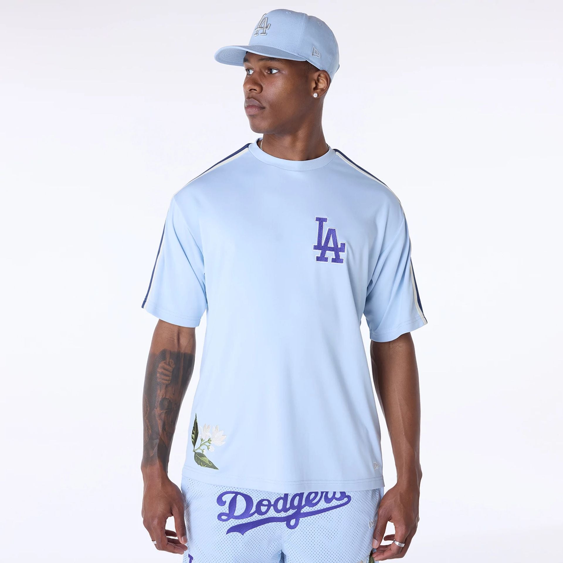 The Male model is wearing LA Dodgers MLB Floral Pastel Blue Oversized T-Shirt 1