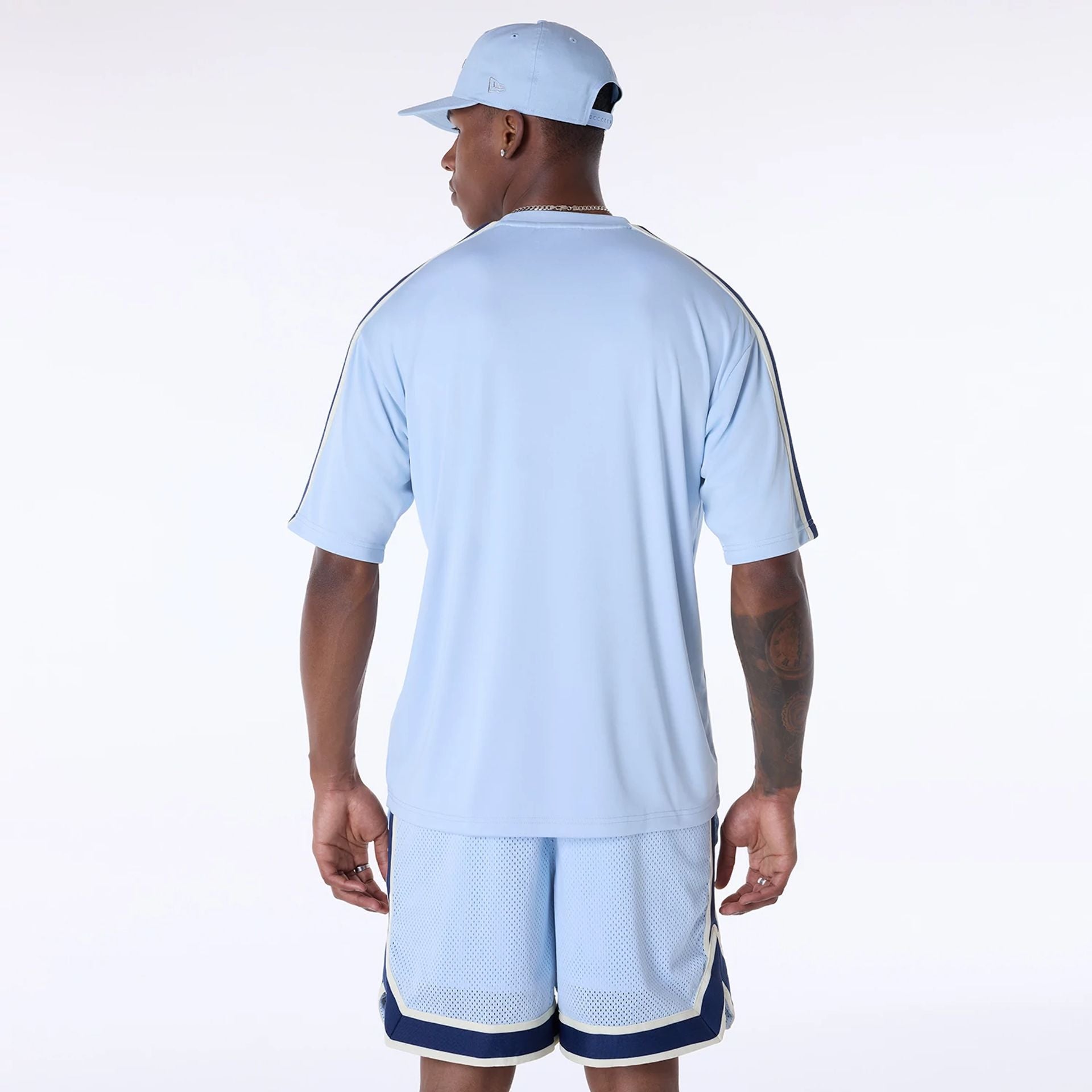 The Male model is wearing LA Dodgers MLB Floral Pastel Blue Oversized T-Shirt 2