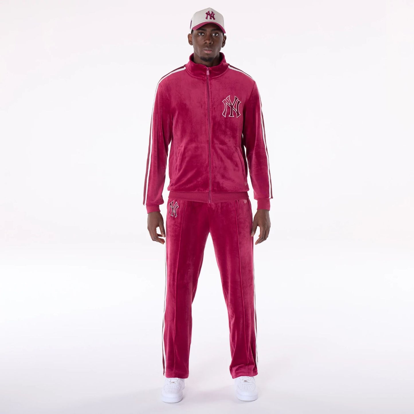 The Male model is wearing New York Yankees MLB Velour Dark Red Joggers 5