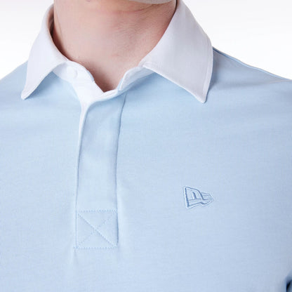 The Male model is wearing LA Dodgers MLB Script Pastel Blue Long Sleeve Polo 6