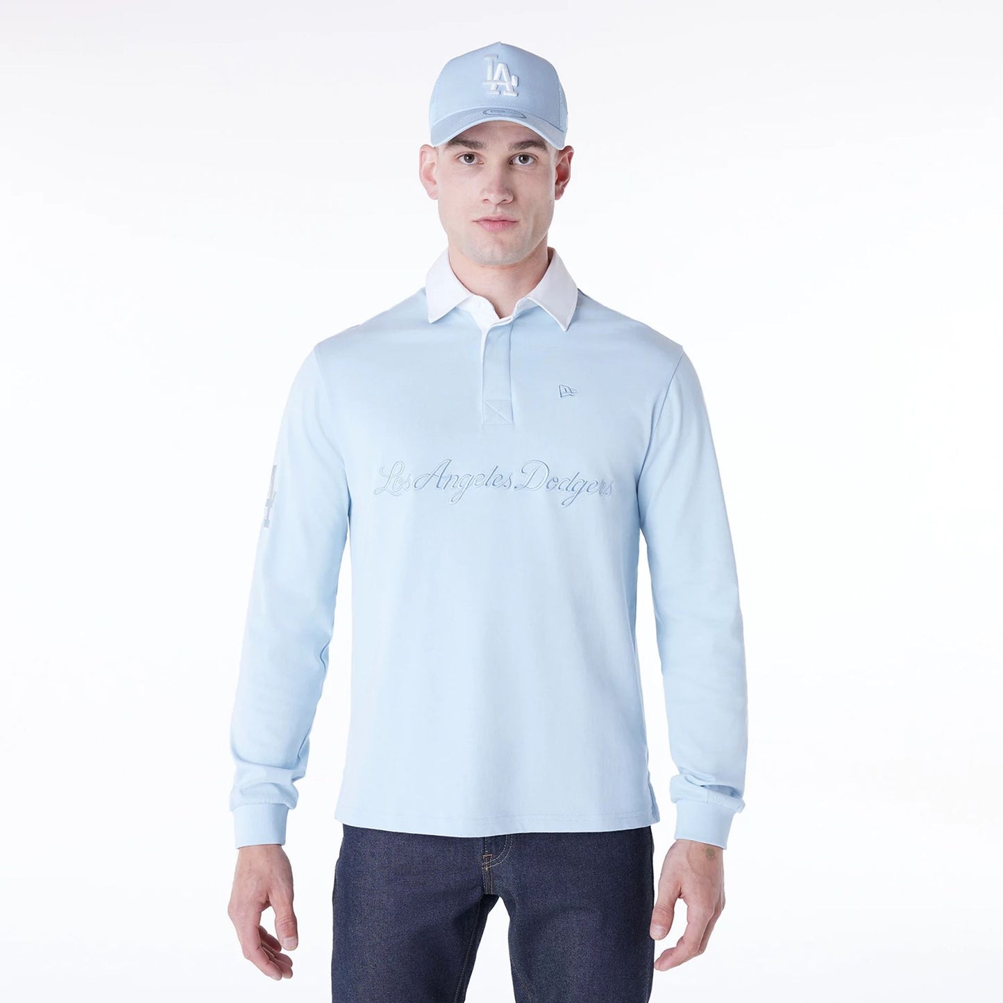 The Male model is wearing LA Dodgers MLB Script Pastel Blue Long Sleeve Polo 1