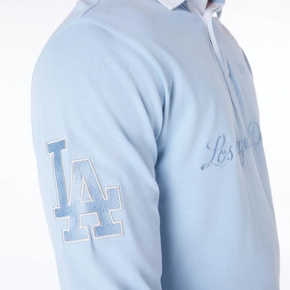 The Male model is wearing LA Dodgers MLB Script Pastel Blue Long Sleeve Polo 5