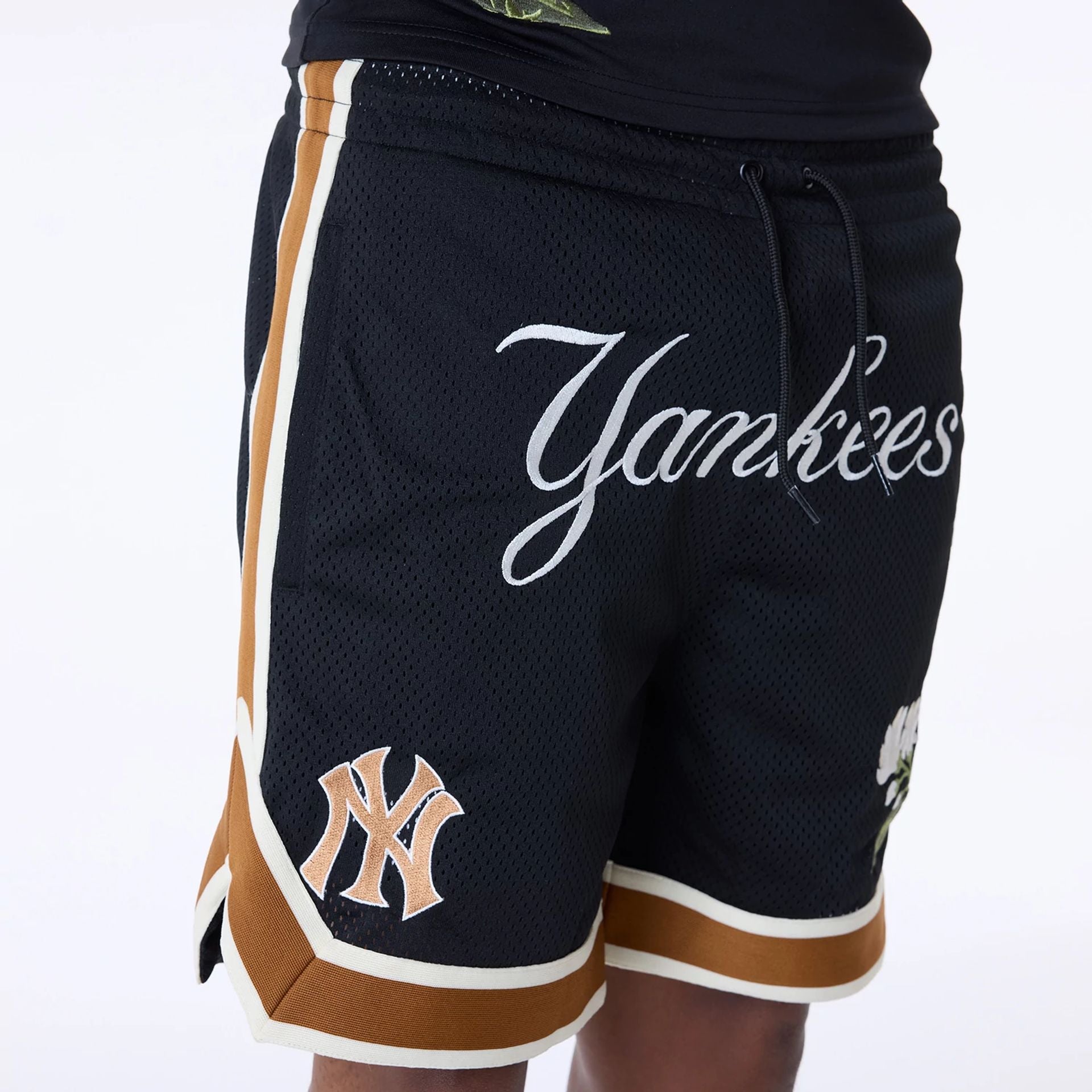 The Male model is wearing New York Yankees MLB Floral Black Shorts 2