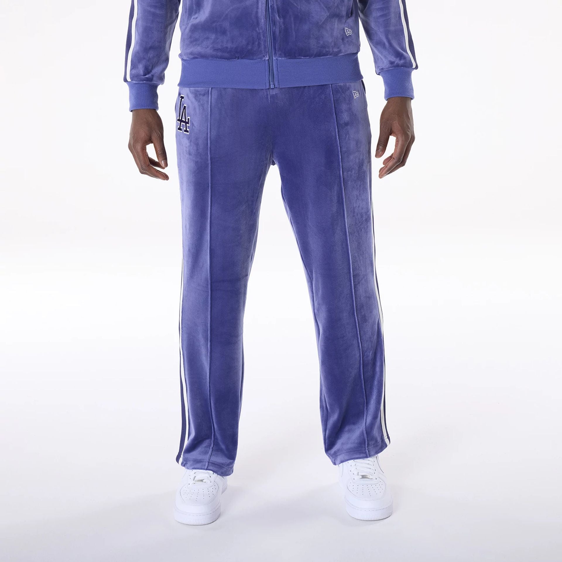 The Male model is wearing LA Dodgers MLB Velour Dark Blue Joggers 1